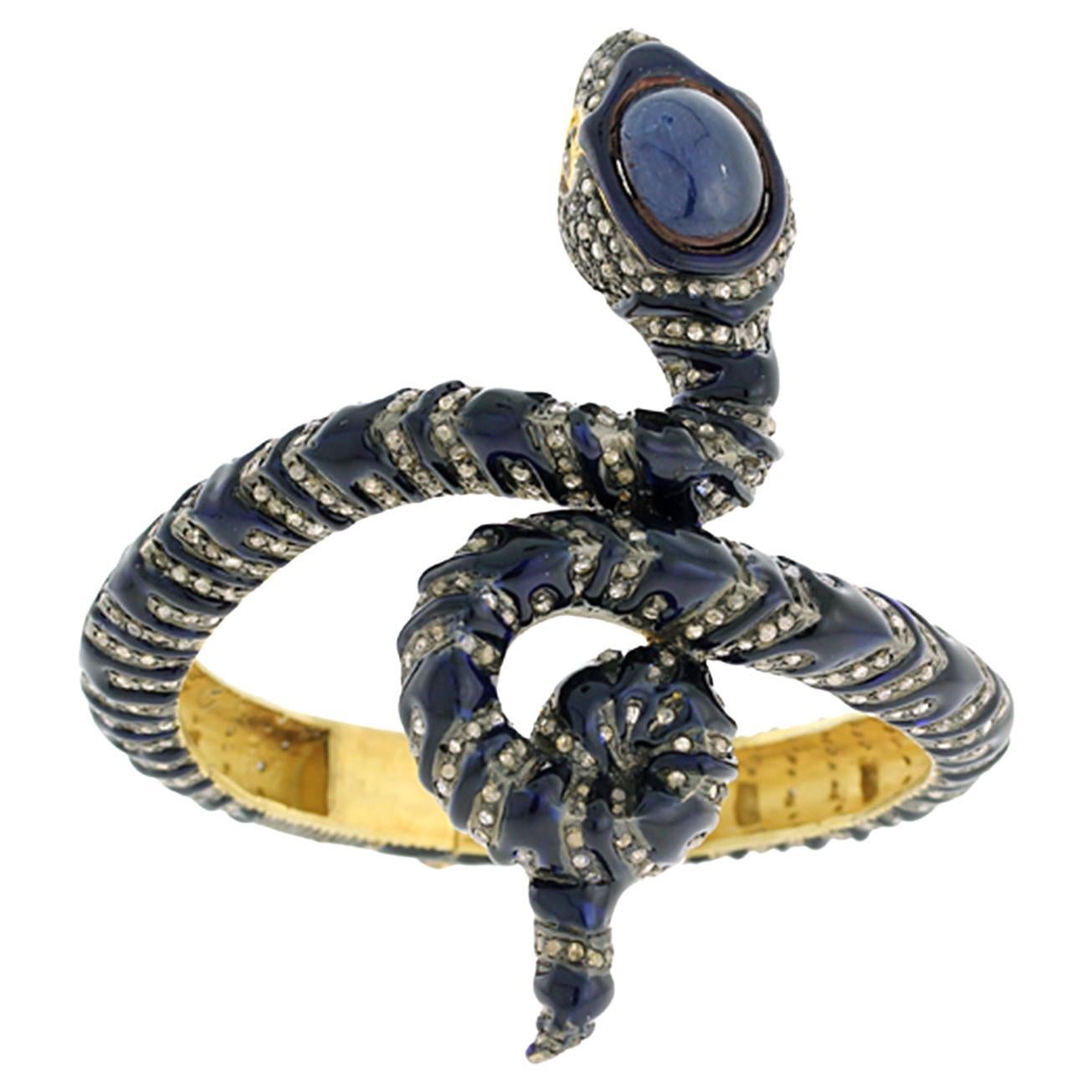 Snake Shaped Blue Sapphire Bangle Accented With Pave Diamonds For Sale