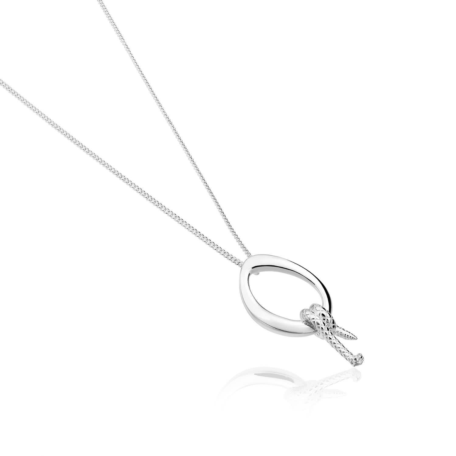 The Snake Small Pendant from the Animal´s Collection by TANE is made of .925 silver. Suspended from a 1.77¨ long chain with extension to 1.88¨, is an irregular link designed for the collection, inspired by nature. At the base of the link, a snake is