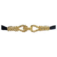 Cintura in pelle di serpente e camoscio con fibbia in corda placcata oro, circa anni '80