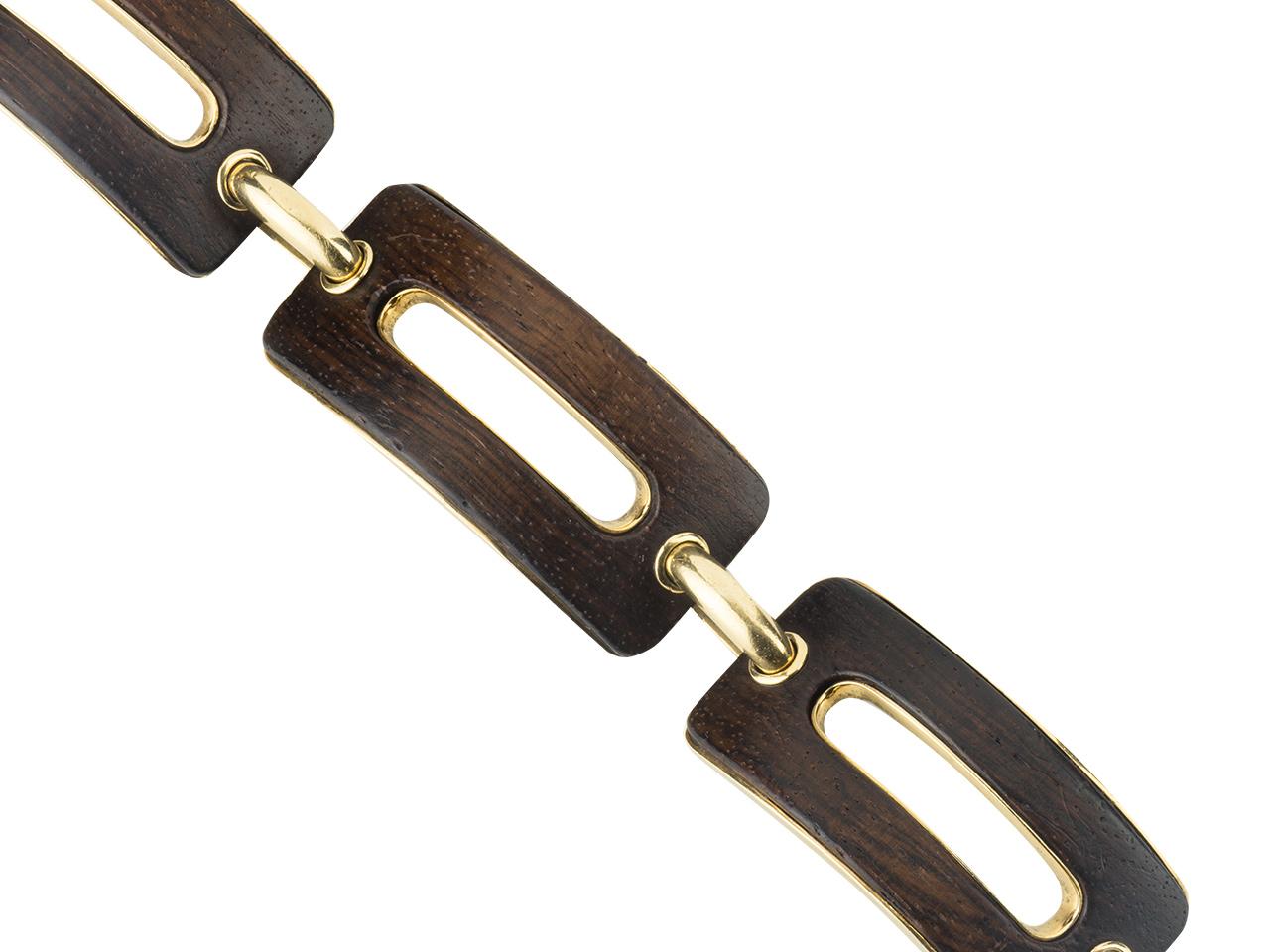 18kt gold and Snakewood link bracket by Gaetan de Percin for Hermès, Circa 1960, with certificate. Number 4144.