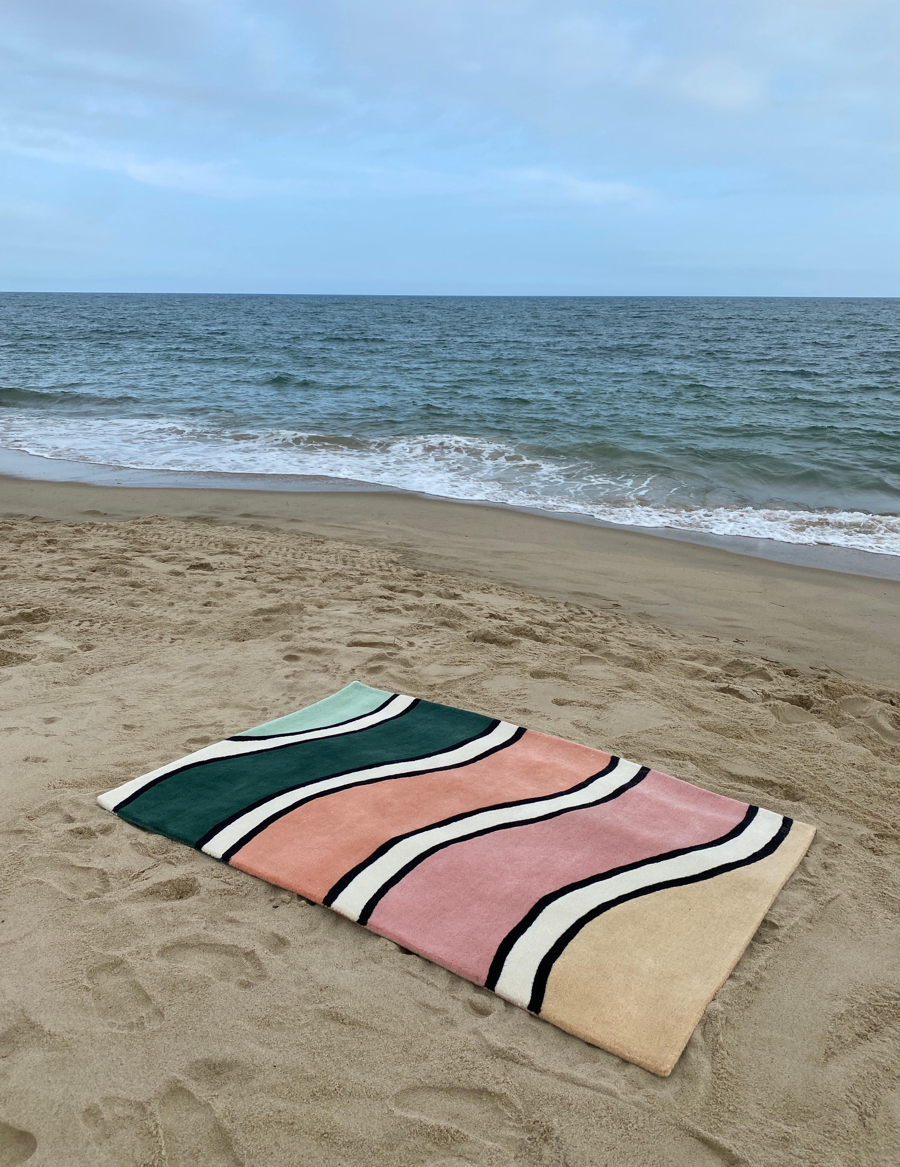 The ?Wavy Rug? is a series of rugs first exhibited in our ?Pieces Homes ?Project in Kennebunk, Maine. The Wavy Rug design concept started as a single rug composed of 10 multi-colored, undulating stripes. From there we imagined how “snippets” of the