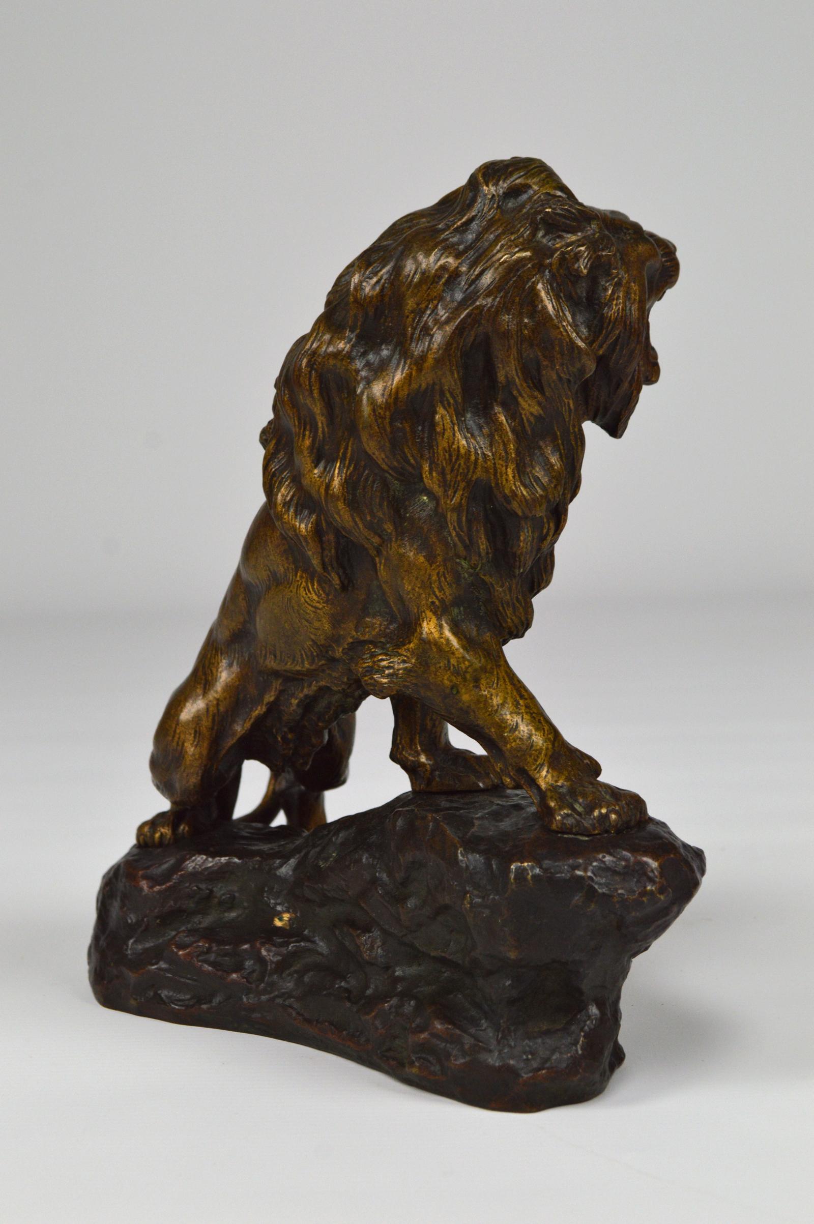 Patinated Snarling Lion in Bronze by Thomas François Cartier, France, Early 20th Century