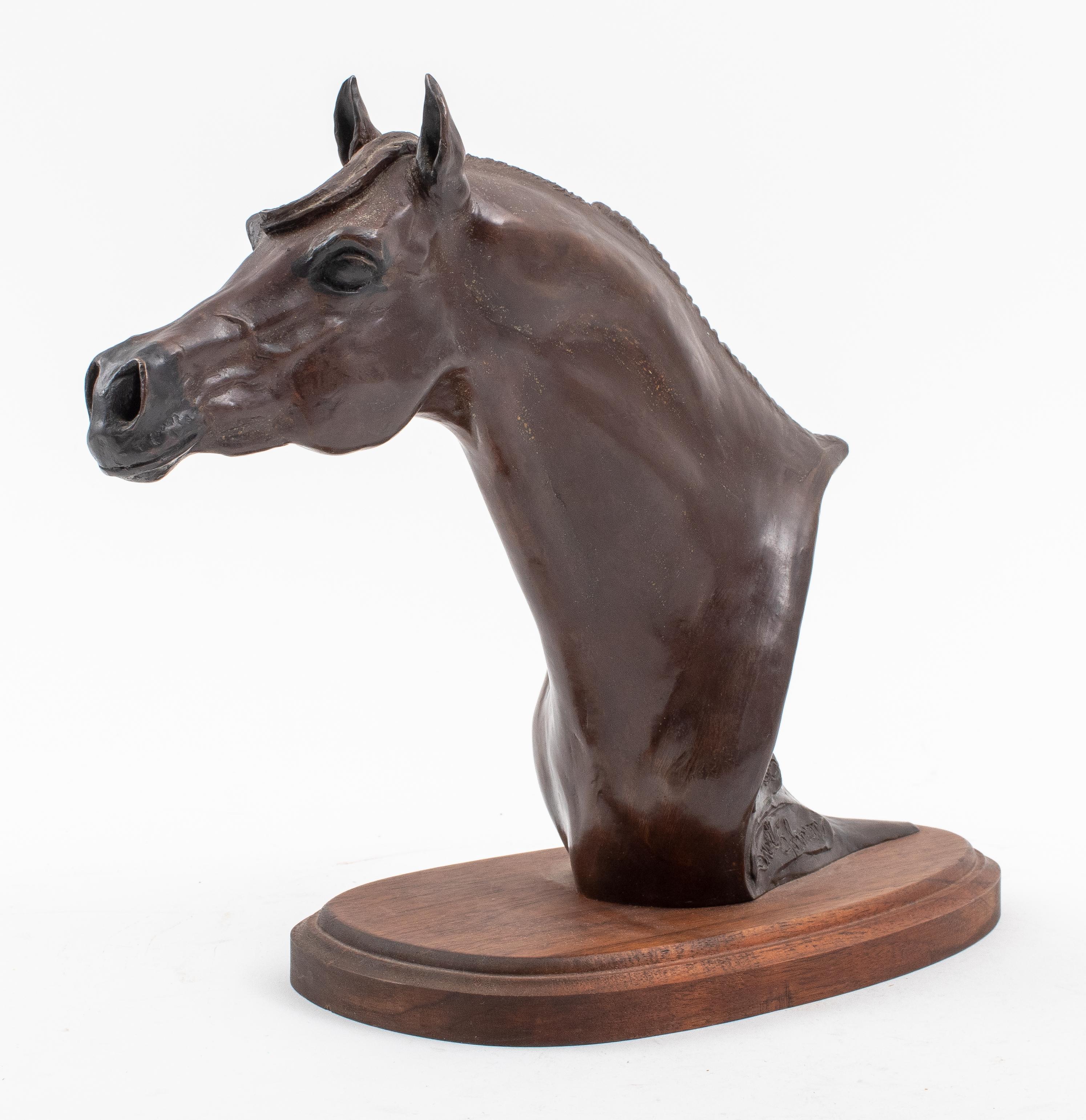 Snell Johnson (American, 1929-2001) bronze horse bust sculpture of NV Pingo mounted on an ovoid wooden base, titled, signed, numbered and marked 