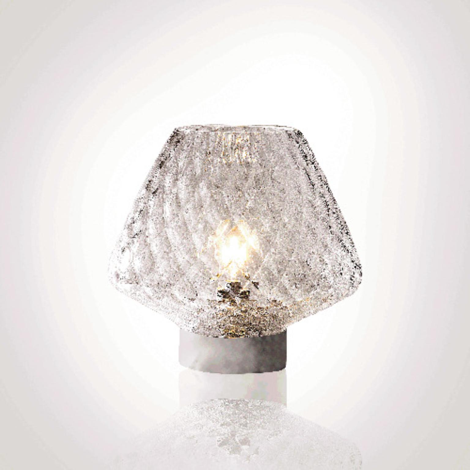 Snifter SNITAMSM Table Lamp by Mazzega 1946
Dimensions: D 33 x H 34 cm.
Materials: Frame: Polished Chrome. 
Diffuser: Crystal Balloton.
Weight: 3 Kg.

The roots of Mazzega1946 are in Murano, a land of master glassmakers who still today preserve the