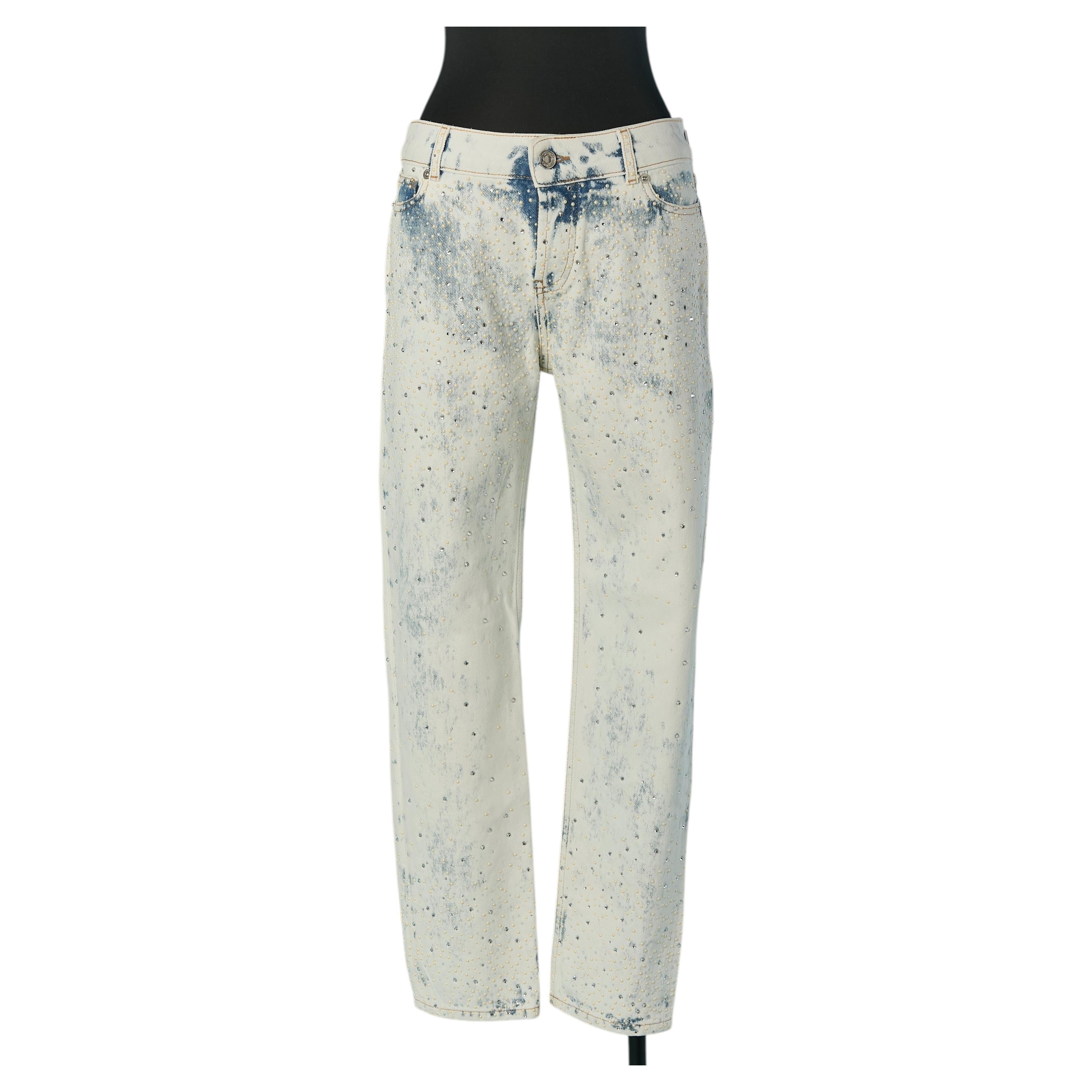 Jeans in denim neve con applicazioni di strass e perle ALEXANDRE VAUTHIER in vendita