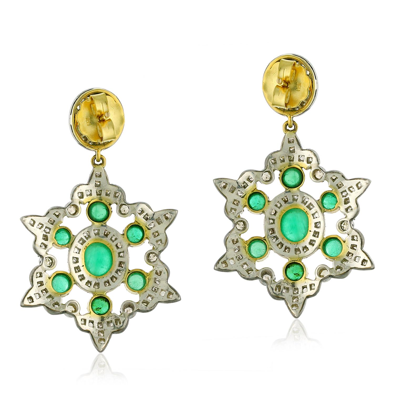 These elegant snow flake shaped earrings are a winter wonder! The delicate gold and silver design is accented with sparkling emeralds and pave diamonds. These earrings are sure to become a staple in your jewelry box. So, don't wait and grab your