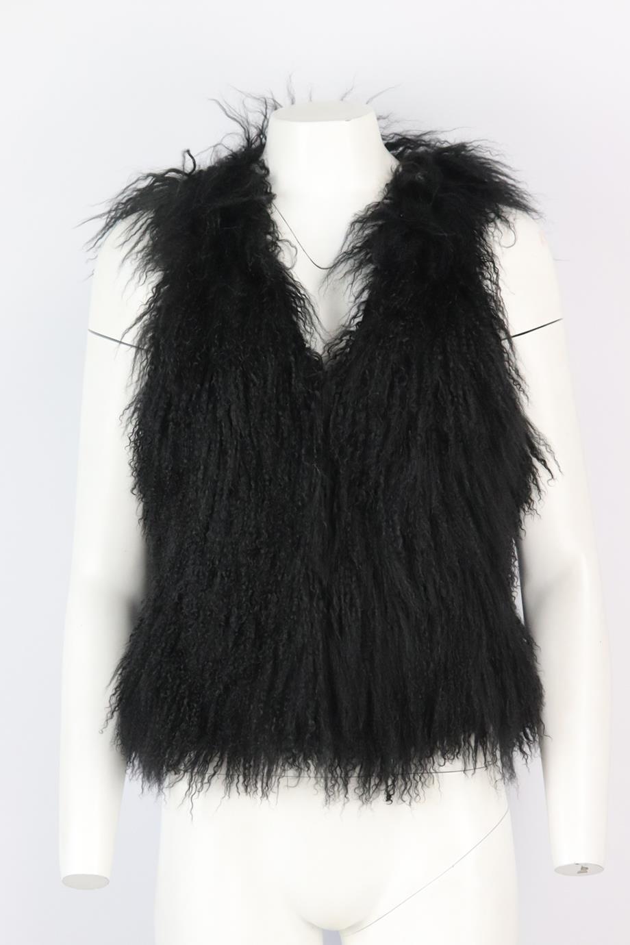 SNOW from St Barth shearling gilet. Black. Sleeveless, crewneck. 100% Lamb; lining: 100% viscose. Size: FR 36 (UK 8, US 4, IT 40). Bust: 32 in. Waist: 32 in. Hips: 36 in. Length: 22 in. Very good condition - No sign on wear; see pictures.
