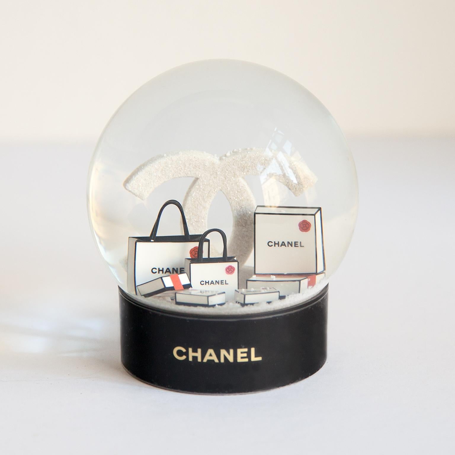 Rare limited edition of a Chanel Snow Ball with white bags on a white base, which are only for VIP Customers in excellent condition and with the original box.

