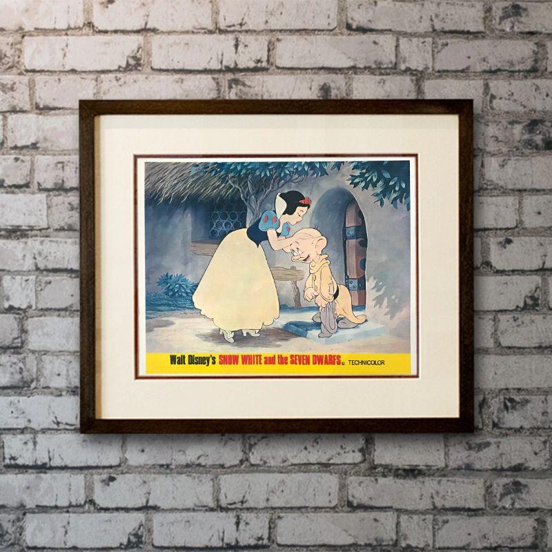 Snow White and The Seven Dwarfs, #5 Unframed Poster, 1960'S / 70'S RR

Front-of-House Card (8 x 10 inches). Exiled into the dangerous forest by her wicked stepmother, a princess is rescued by seven dwarf miners who make her part of their