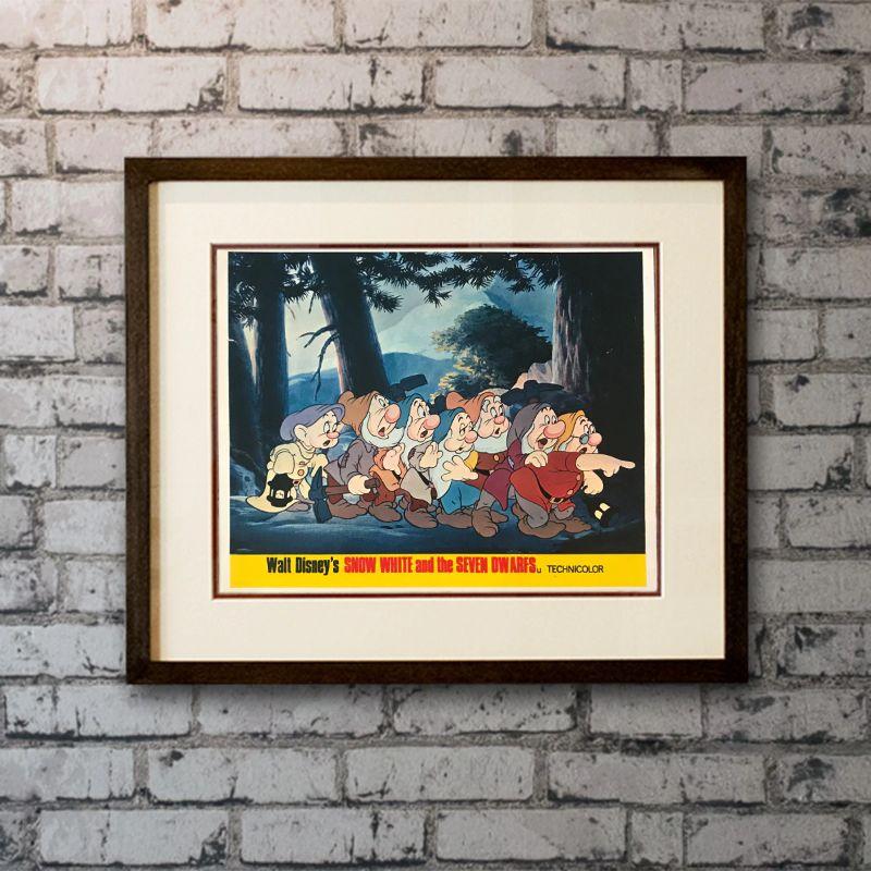 Snow White and The Seven Dwarfs, #7 Unframed Poster, 1960'S / 70'S RR

Front-of-House Card (8 x 10 inches). Exiled into the dangerous forest by her wicked stepmother, a princess is rescued by seven dwarf miners who make her part of their