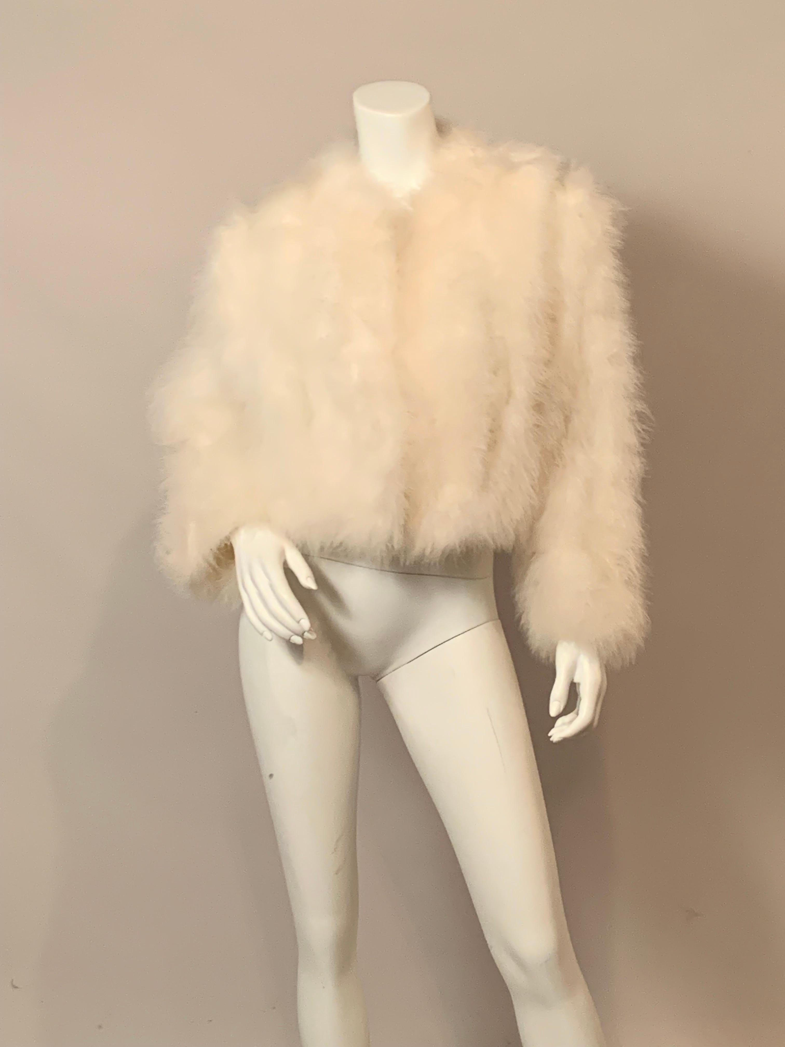 Something to tickle your fancy, this snow white marabou feather jacket is in 
