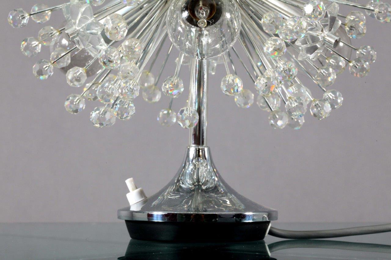 Snowball table lamp,
Emil Stejnar for Rupert Nikoll,
Vienna, 1950.
Chrome base, crystal glass balls.
