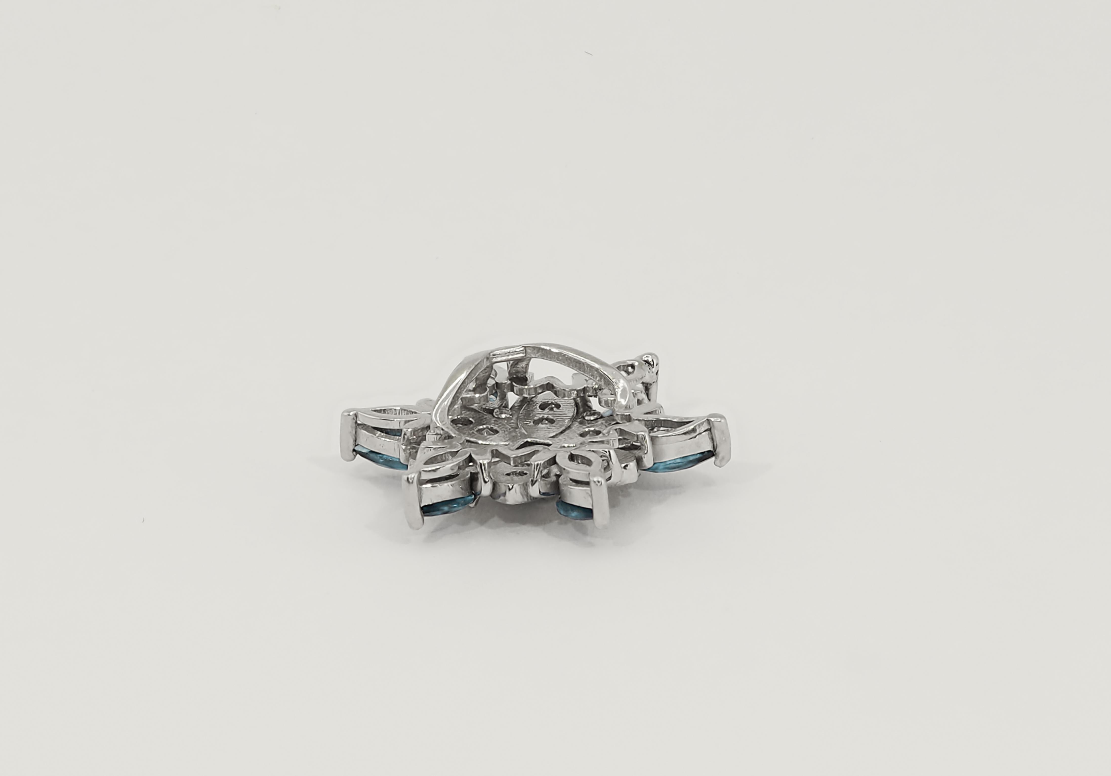 Pendentif en or 14k en forme de flocon de neige. Collier d'hiver. Collier du Nouvel An. Pendentif en topaze maquise. Le charme de la neige. Pendentif de glace. Charme de la reine des neiges.

Métal : or 14 k
Poids : 1.7 g.
Taille : 15,5x15,5