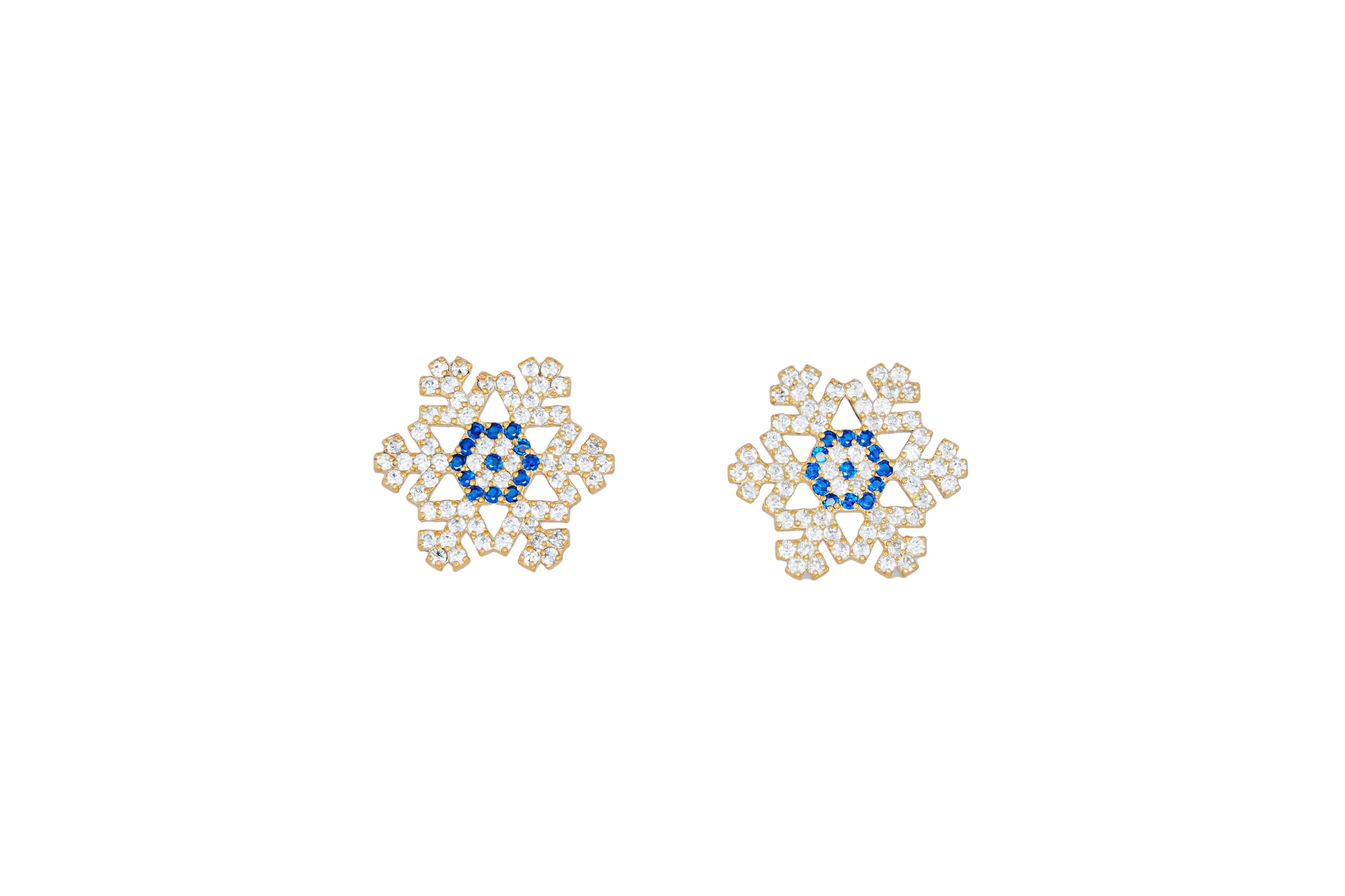 Snowflake 14k gold studs. 
Snow gold Earrings. Christmas Earrings Jewelry. Christmas Present for her. Sparkly gold Earrings. Christmas Tree gold studs. Santa Earrings.

Total weight: 2.2 g.
Metal: 14k solid gold
Gemstones: multicolor sapphires and
