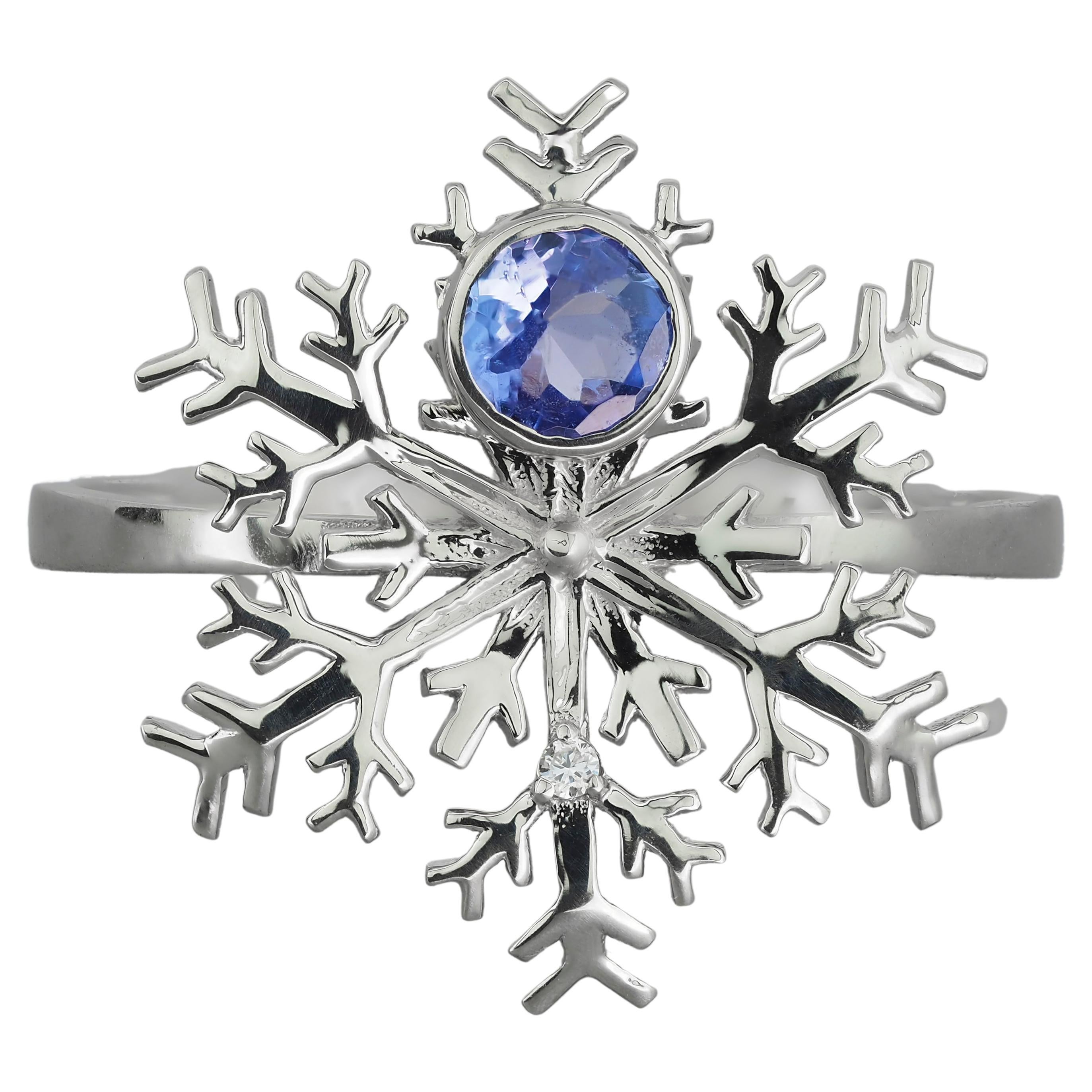 For Sale:  Tanzanite gold ring. Snowflake 14 karat Gold Ring with Tanzanite and Diamonds.