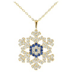 Snowflake charm necklace in 14k solid gold. 