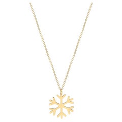 Snowflake charm necklace in 14k solid gold. Gold Snowflake Pendant.
