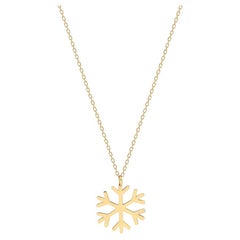 Snowflake charm necklace in 14k solid gold. Gold Snowflake Pendant. 