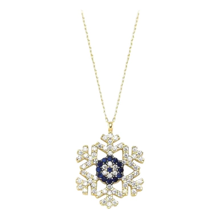 Collier à breloques flocon de neige en or massif 14 carats. Pendentif flocon de neige en or. Cadeau de Noël pour elle. Collier à pendentifs Reine des neiges. Bijoux d'hiver à offrir.

Poids total : 2,27 g.
Or massif jaune 14k
Longueur : 42 sm.
Style