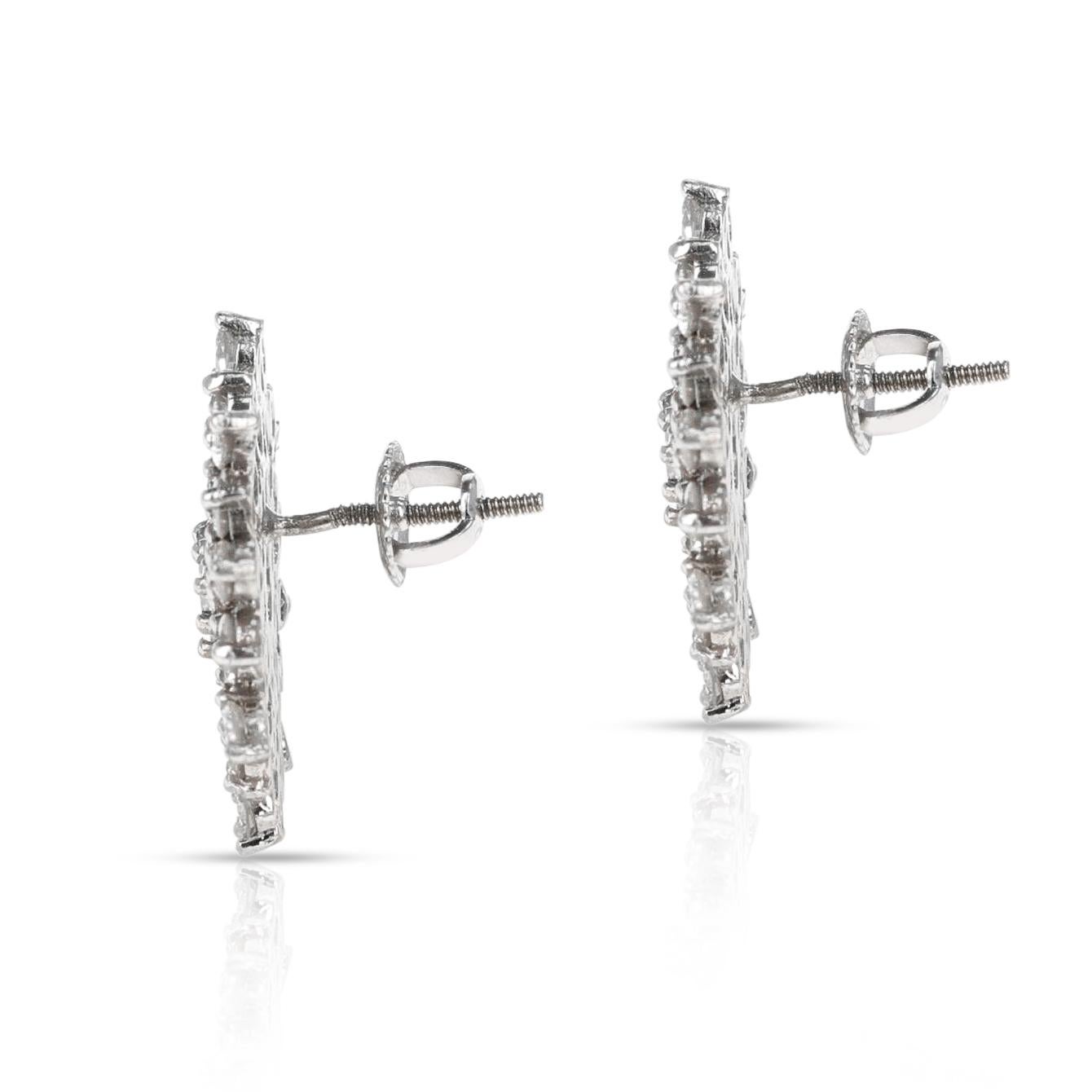 A stunning pair of Snowflake Floral Diamond Earrings made in 14k White Gold. The size of the earring is 0.90 inches. The weight of the earring is 7 grams. 
