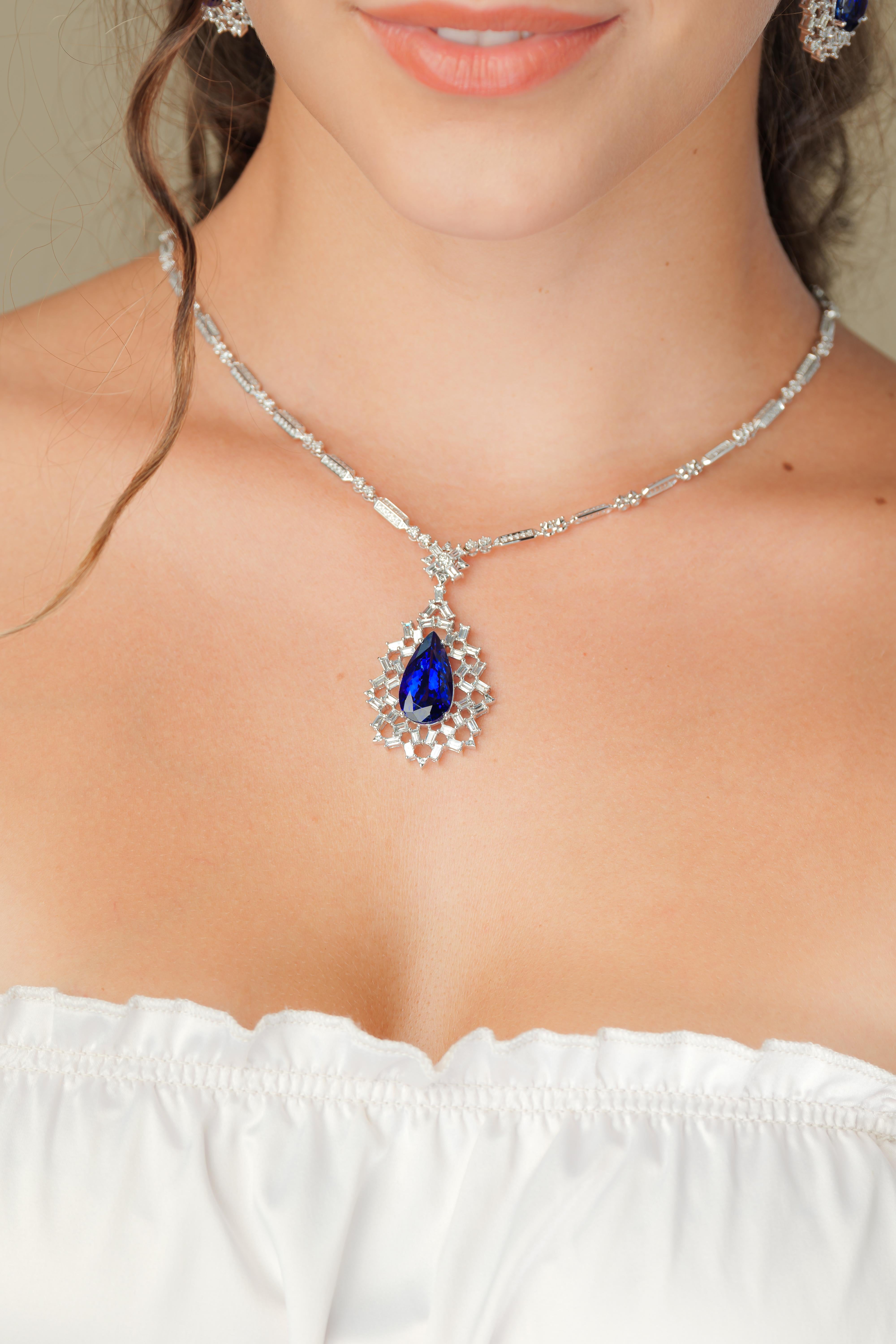 Snowflake Tanzanites! This collection features elegant pear shaped Taznzanites that are encompassed by a cage of baguette cut icy white diamonds set in white gold.

Snowflake tanzanite and diamond necklace in 18K white gold. 

Tanzanite: 11.97 carat
