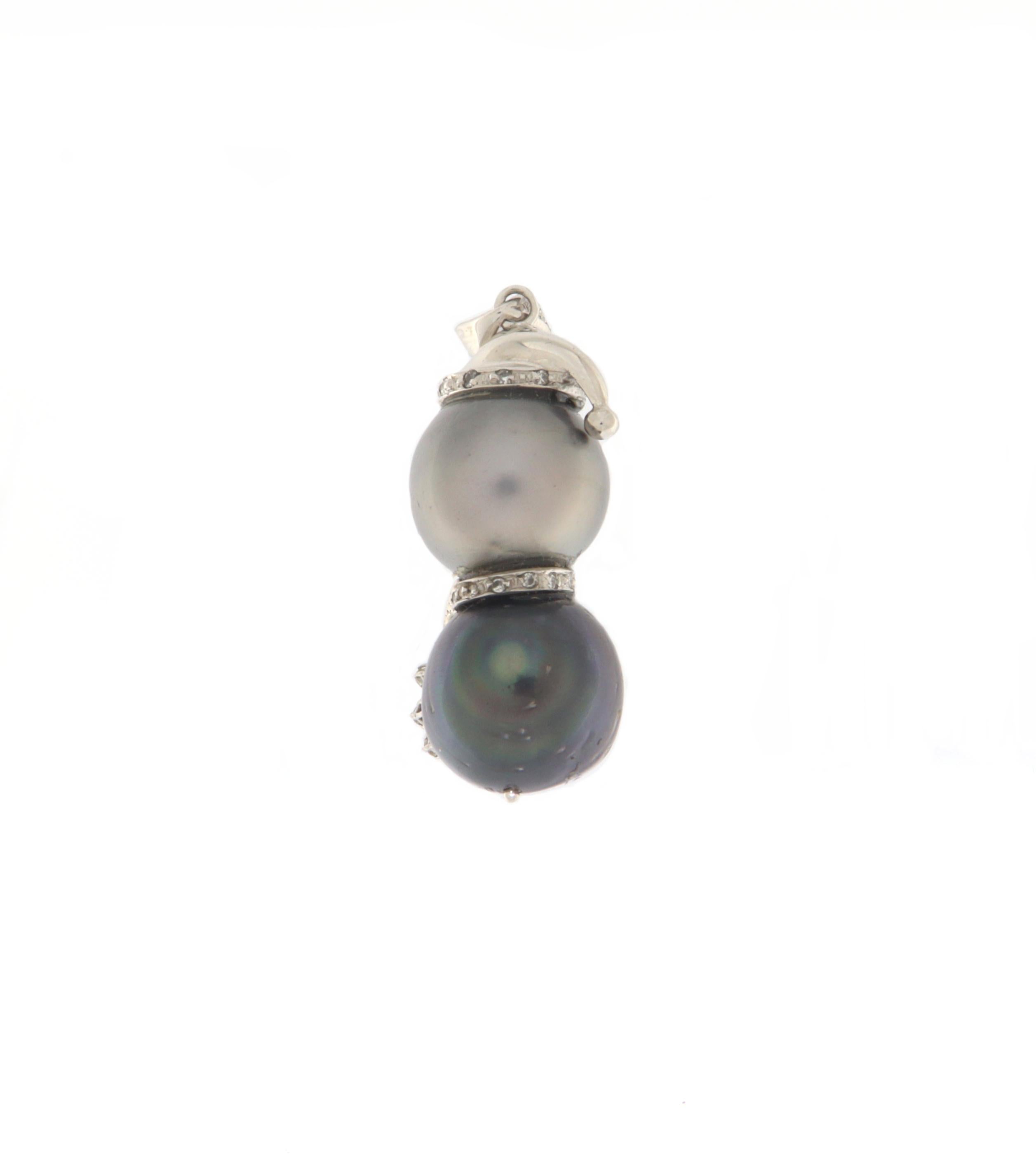 Exquisite handcrafted pendant depicting an elegant snowman, perfect for those who love unique jewelry and desire a winter-themed accessory with a touch of luxury. Crafted from 18-karat white gold, this precious piece is adorned with diamonds and