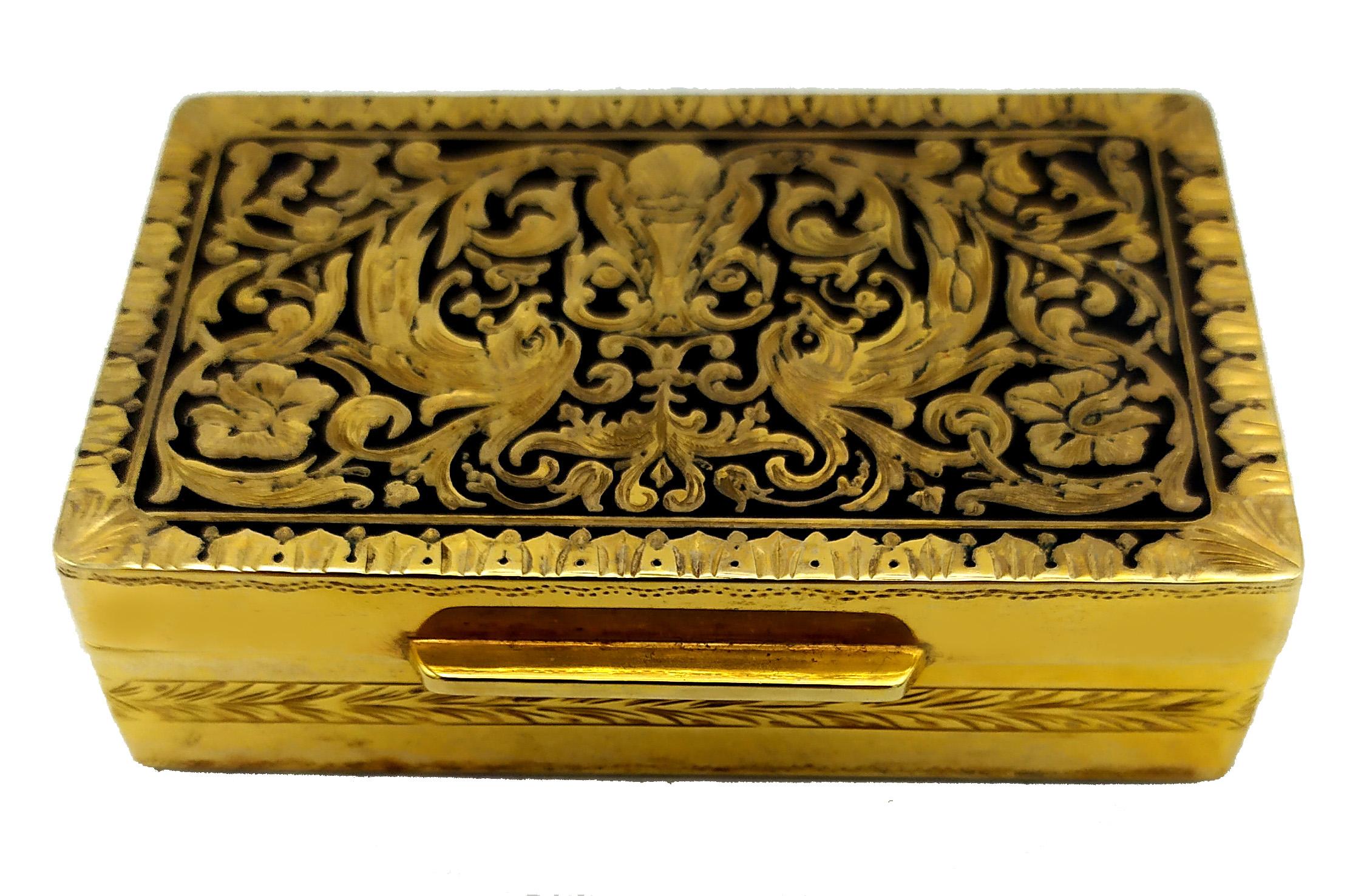 Rectangular snuffbox in 925/1000 sterling silver gold plated with fine hand-engraving Baroque style on the lid, with fired enamel black type “niello”. Measurements cm. 4,3 x 7 x 2. Weight gr. 120. Designed by Franco Salimbeni in 1971 and