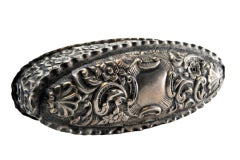 Snuff box in embossed silver