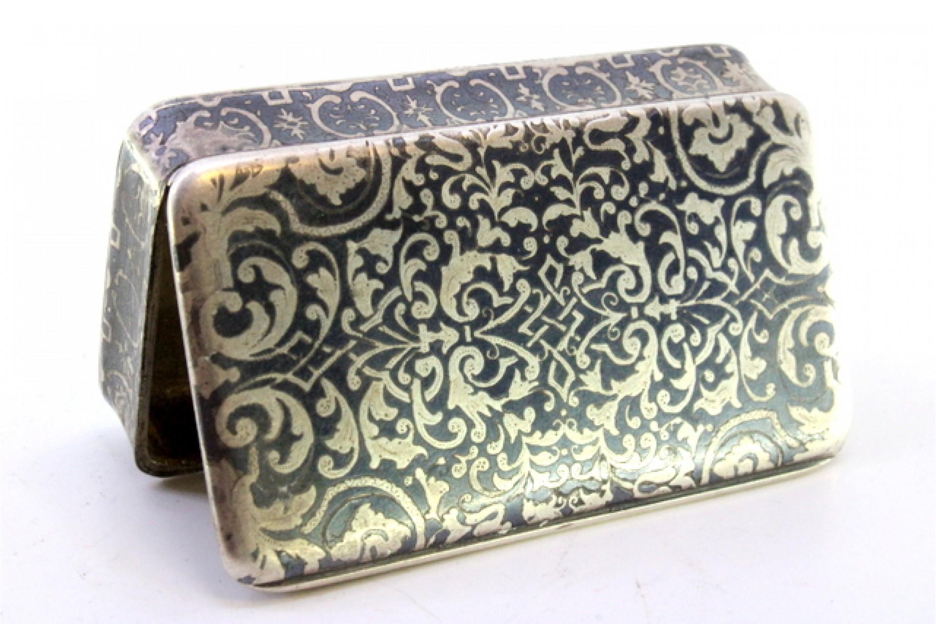 Description: Nickel-plated silver snuff box with gold interior and hinged lid. Metal: Silver. Origin: French. Brand: Tête Minerve. Weight: 73.01 grams. Dimensions: 7cm x 4cm. Content: 800/1000. Assay Mark: Yes, since 1838. Additional information: