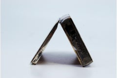 Snuff box in nickel silver in the Russian style with a gold base and city motifs