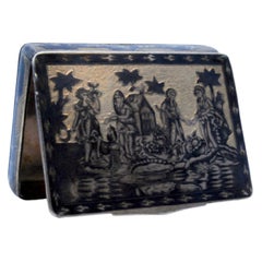 Snuff box in nickel silver in the Russian style with a gold base and city motifs