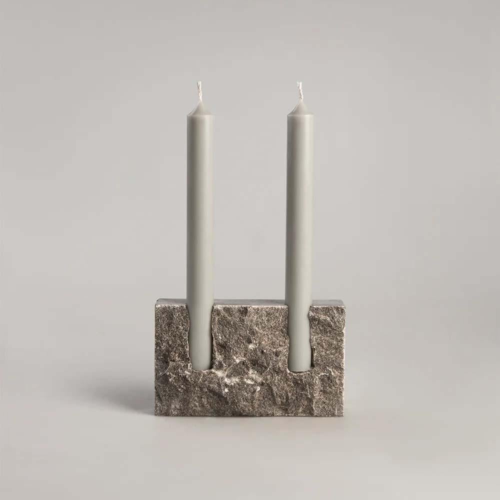 Handcrafted candle holder in natural stone with rock face front (hand chipped) and smooth sides. 

Please note that each stone is unique and reacts differently, therefore important variations in shape and texture occur. 

Technical details