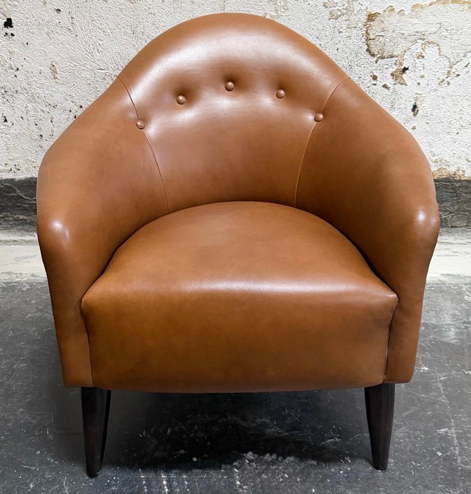 Curvy button-tufted tub lounge chair inspired by, and in homage to, the curvaceously biomorphic Swedish designs of Kirsten Horlin-Holmqvist (sometimes written as “Holmquist”) of the 1940's and 50's. Reimagined in a different scale and size more