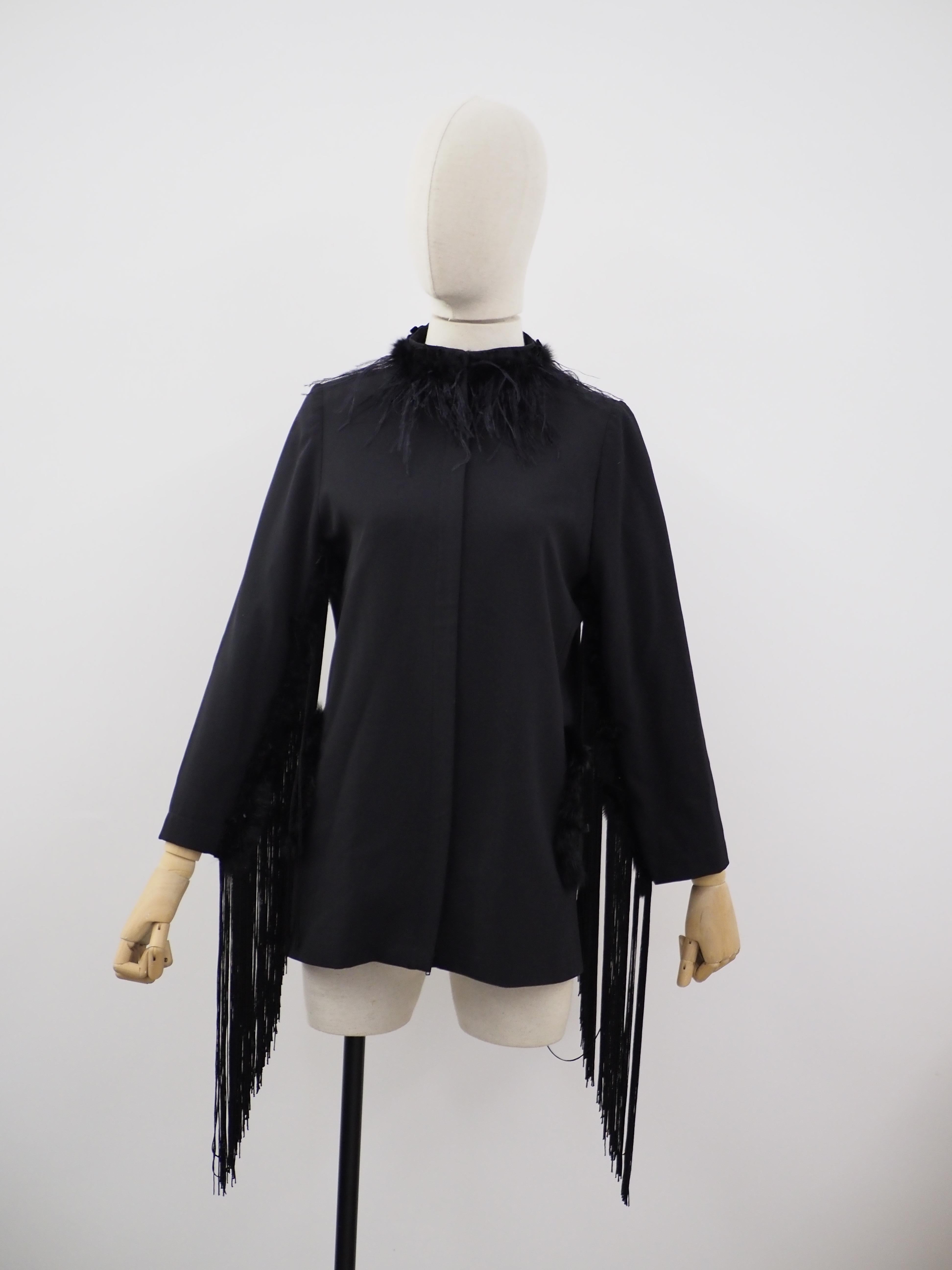 Soab Black fringes jacket
Soab recycled jacket
embellished with fringes all over