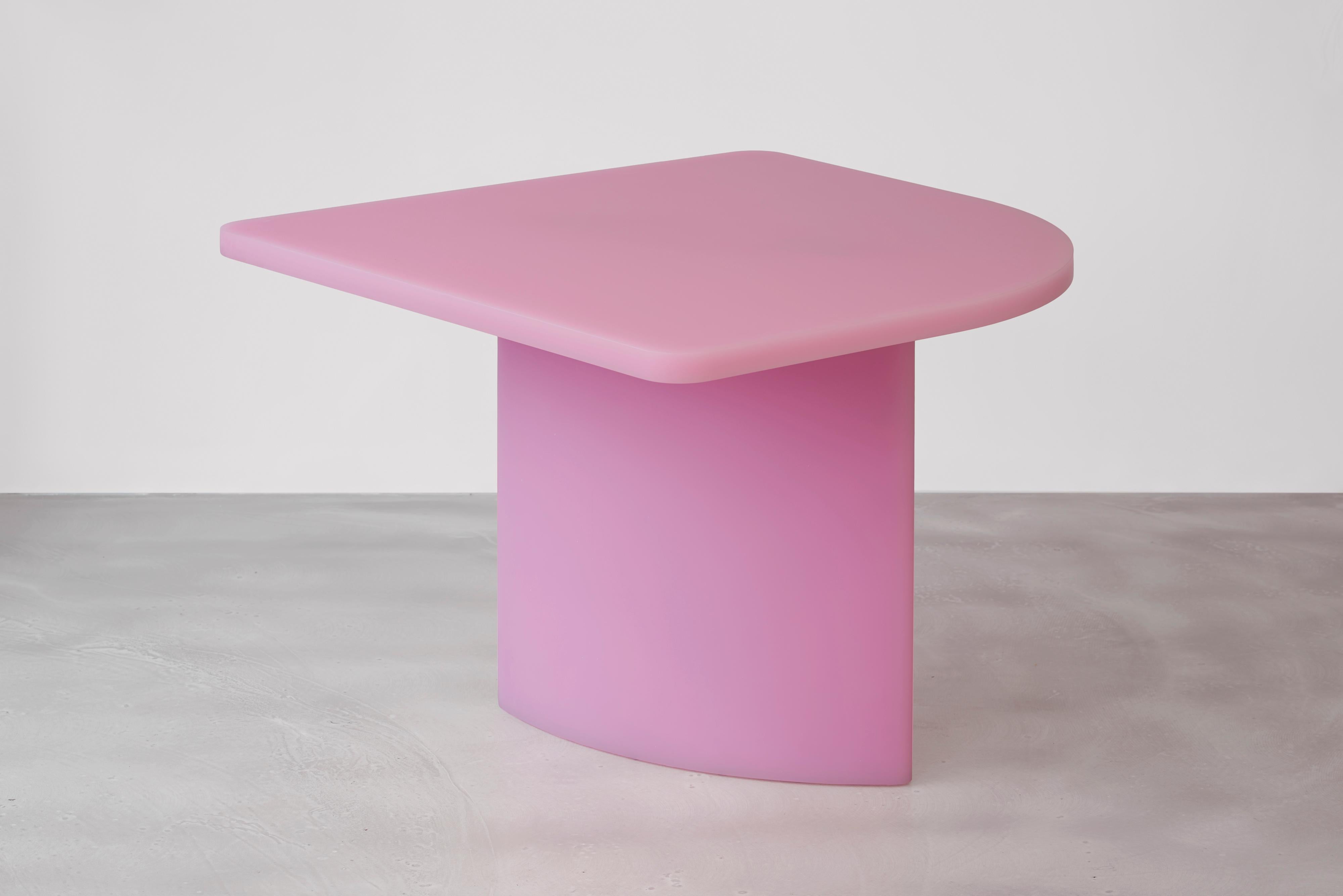 Semi-polished resin table by Sabine Marcelis from the SOAP Series. It is designed with the sound psychology of dining in mind. When people are dining, things they put down on the table resonates a muter sound thanks to the nature of resin.