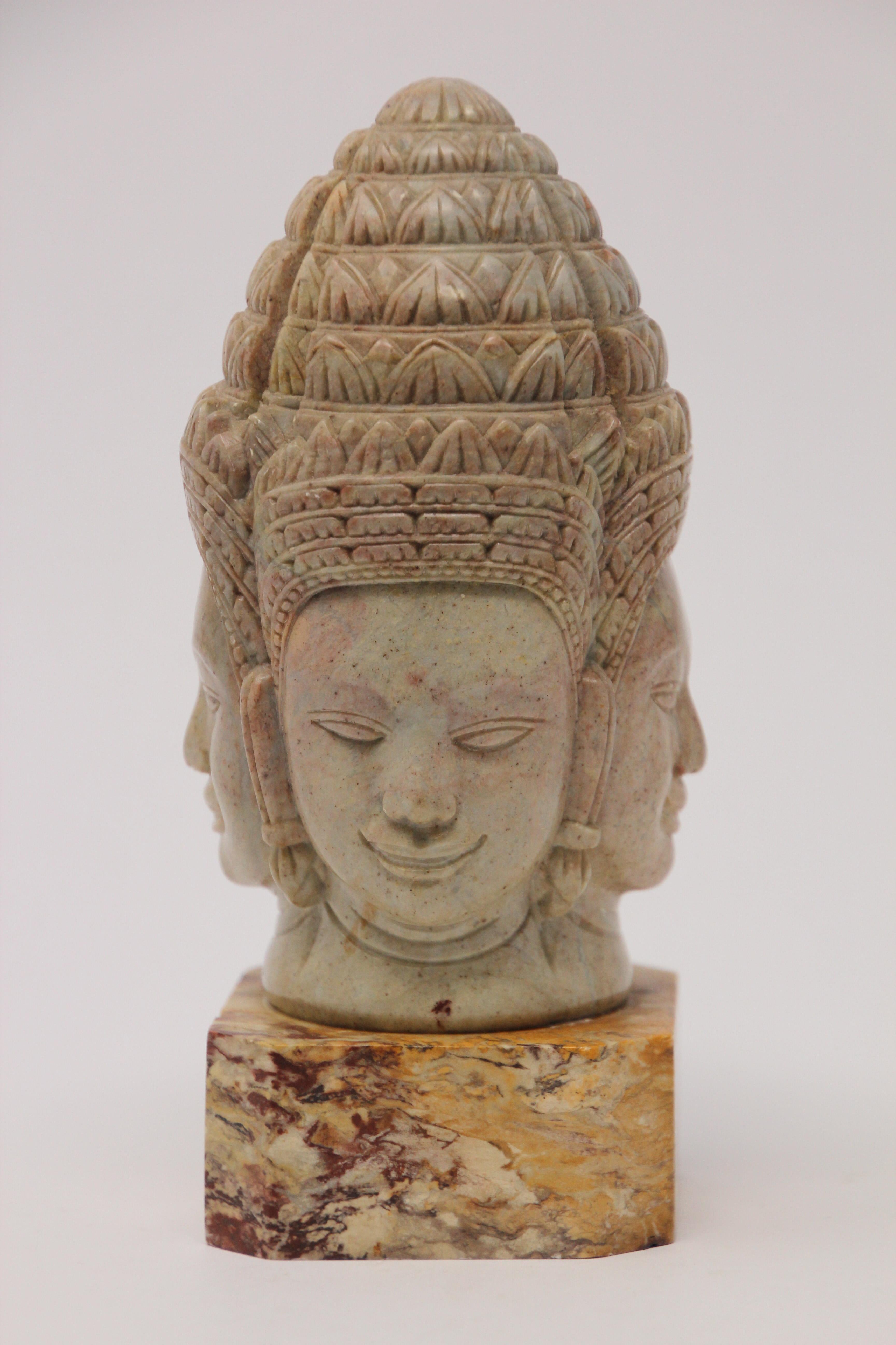 This bust is a beautiful representation of lord Brahma.
Brahma is a part of the holy trinity of Hinduism along with Vishnu the Preserver and Shiva the destroyer.
He is depicted in Hindu iconography with four faces
Each one of Brahma's smiling faces
