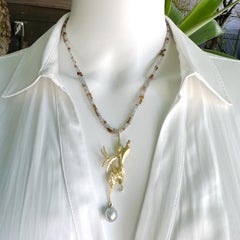 "Soaring" Bird Pendant in 18 Karat Gold with Baroque Silver Akoya Pearl