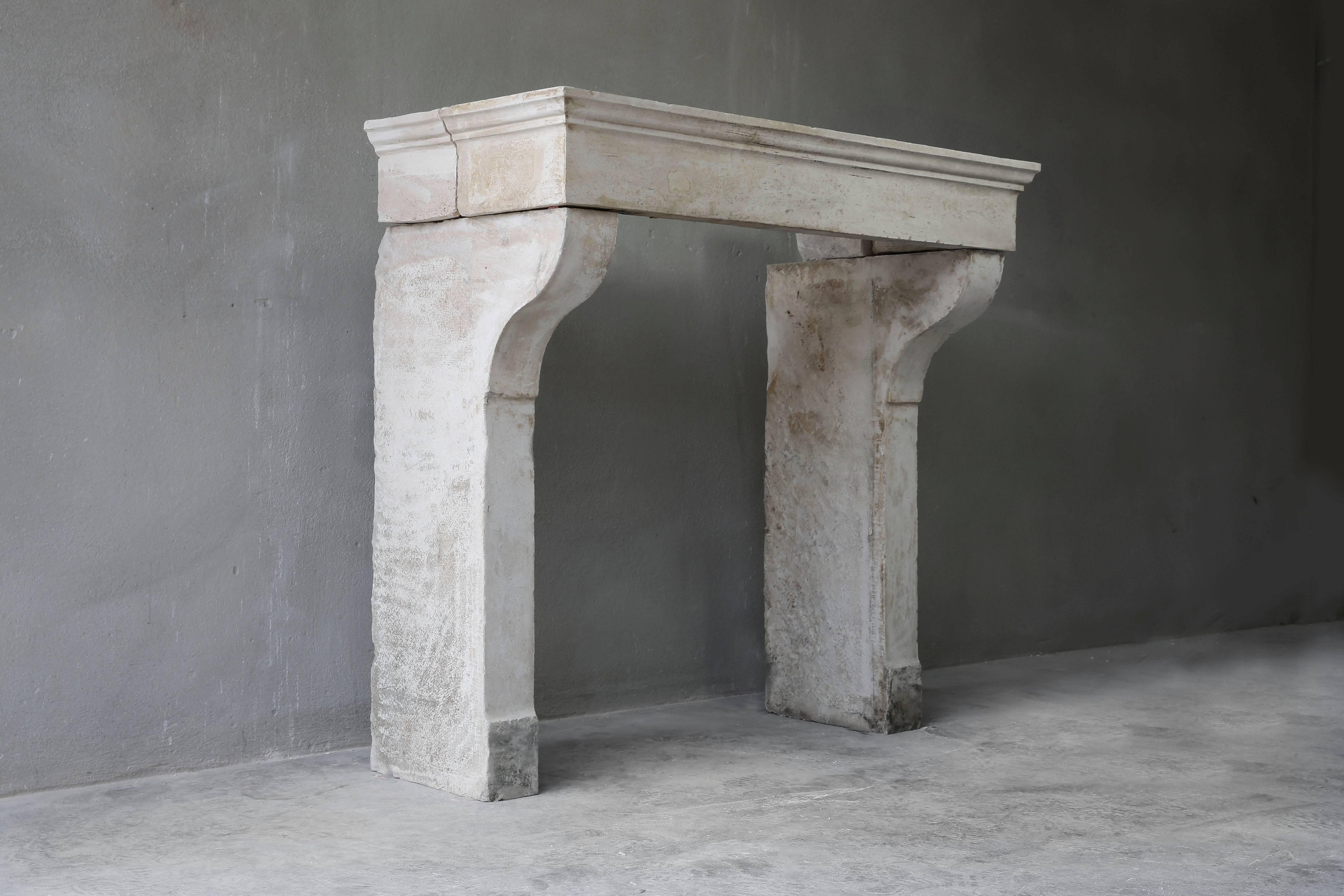 A nice sober antique fireplace from the 19th century in the style of Campagnarde. Made of French limestone!