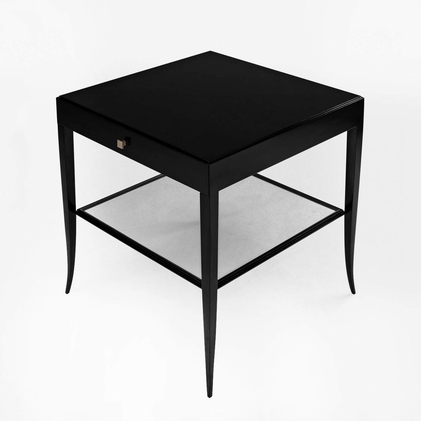 Nightstand or side table sober with handcrafted
solid mahogany wood structure in black satinated
finish. With 1 drawer and with 1 tempered clear glass
top at the bottom with forged iron frame.
Also available in ivory lacquered, white