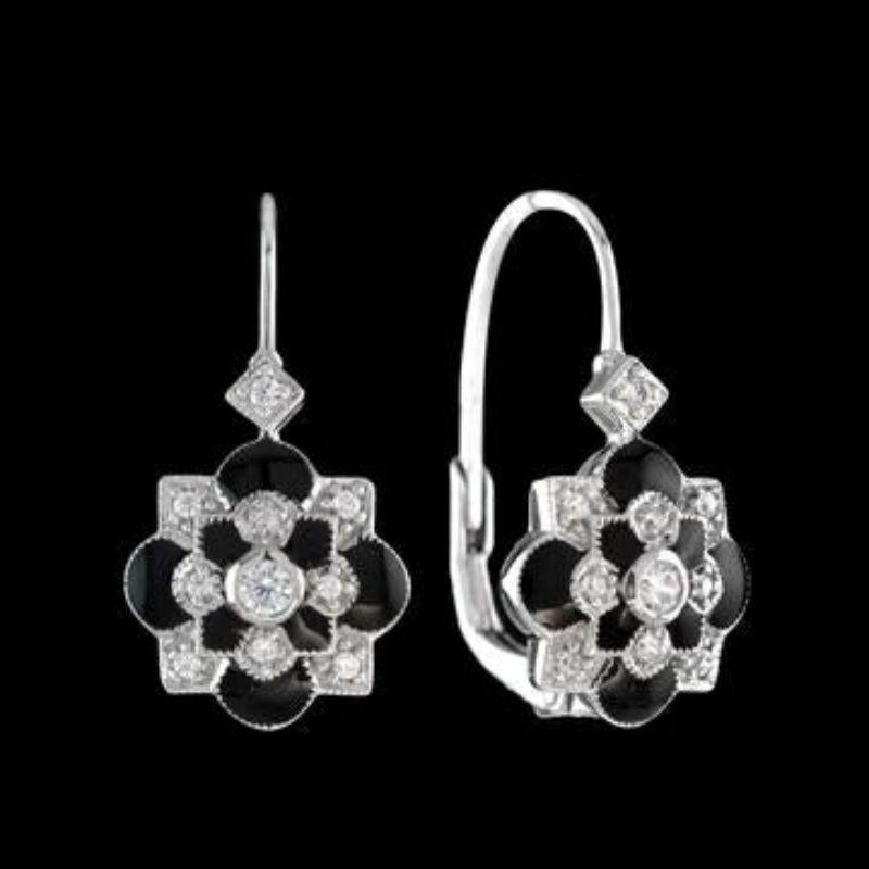 Social Climber Diamond, Black Enamel Earrings

The Social Climber earrings are fantastic for anyone who loves the sophistication of black enamel contrasting with vibrant diamonds, featuring the iconic clover design.  The perfect gift for your social