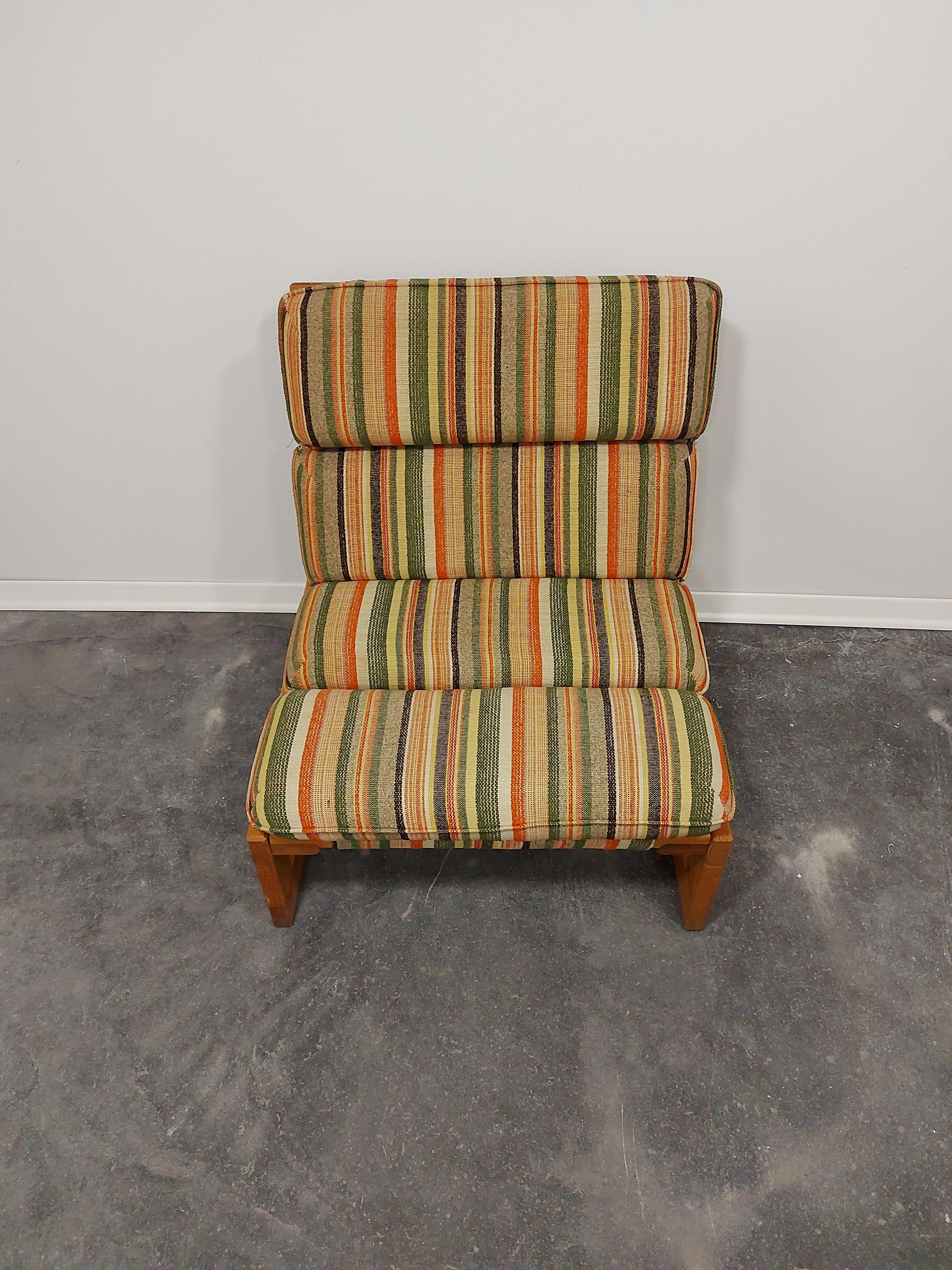 Midcentury rainbow 1, 2 or 3 seat sofa, 1970s.

Colorful fabric of all cushions is in splendid condition and cushions are removable.

The frame of the sofa is made from solid wood. This sofa is overall in a very well preserved vintage condition,