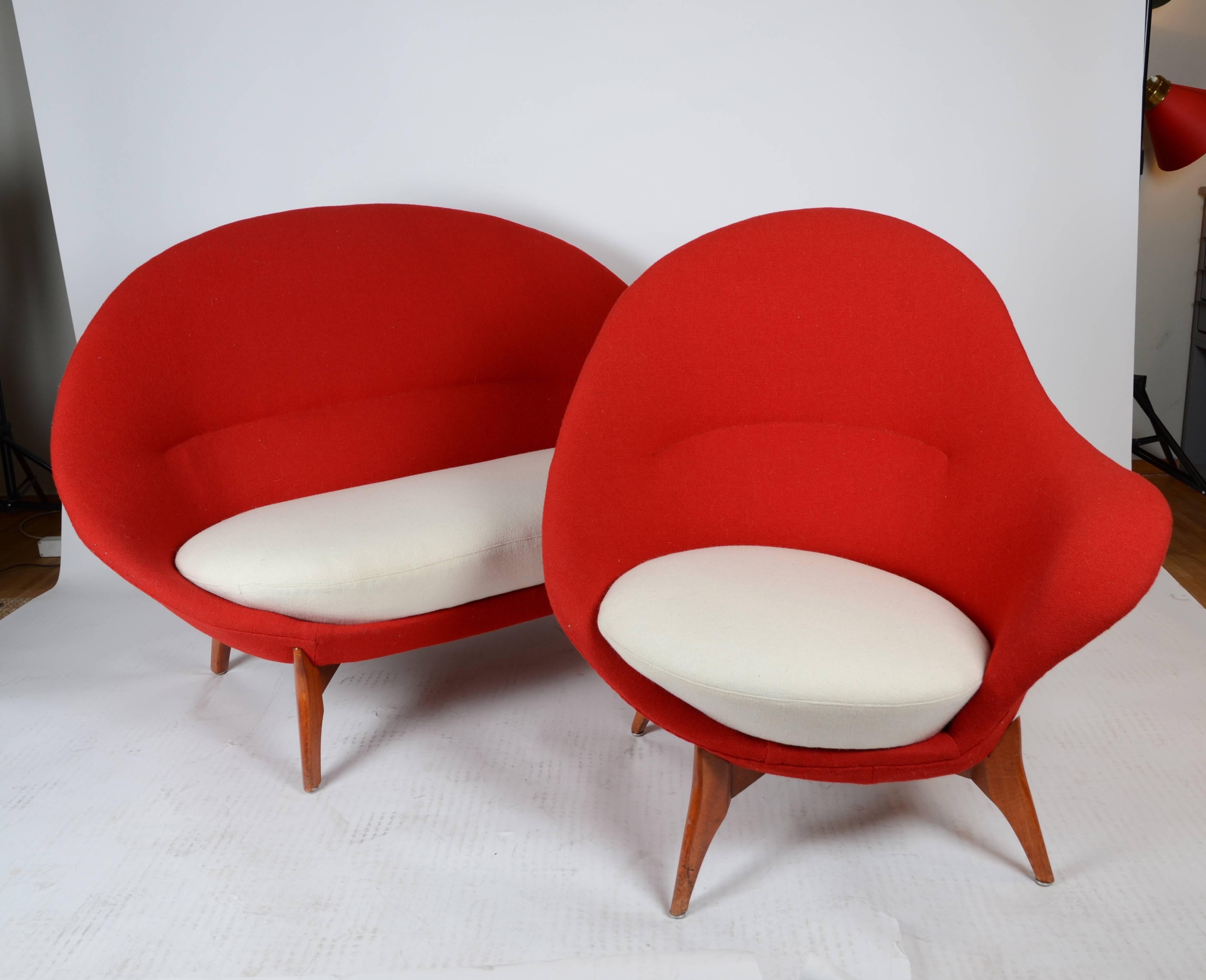 A sofa and lounge chairs, Danish design, mid-1900s. Reupholstered in wool fabric.