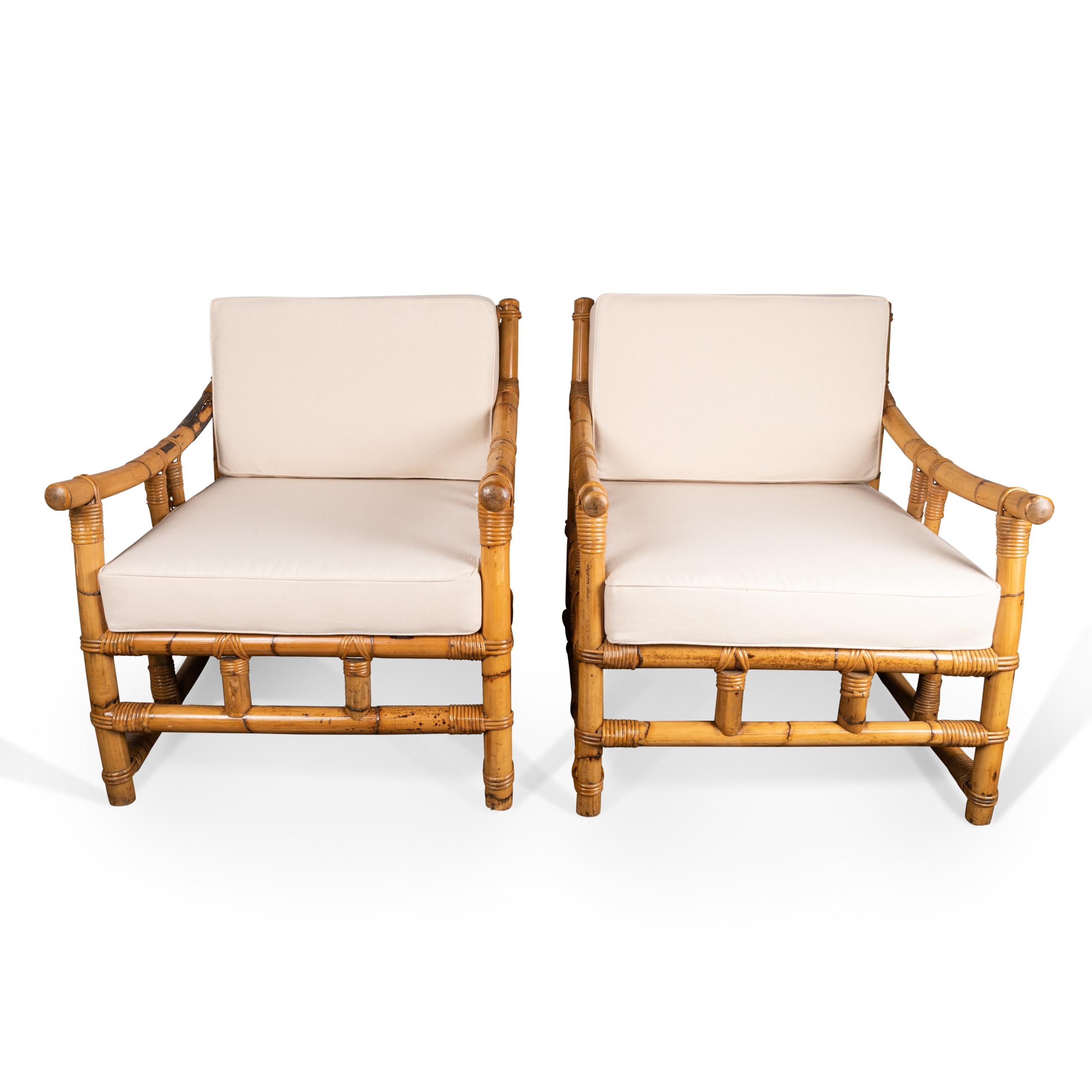 Living room set composed of a sofa and a pair lounge chairs. 
Removable cushions. 
Newly upholstered in ecru fabric.
Rattan.
Attributed to Vivai del Sud. 
Italy 
circa 1970

Lounge chairs dimensions ( Per lounge chair) :

Height : 81 cm /