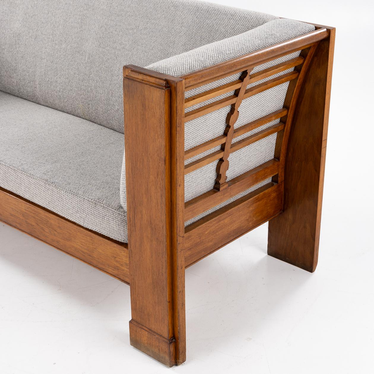 Sofa attributed to Frits Henningsen in patinated oak new wool. 