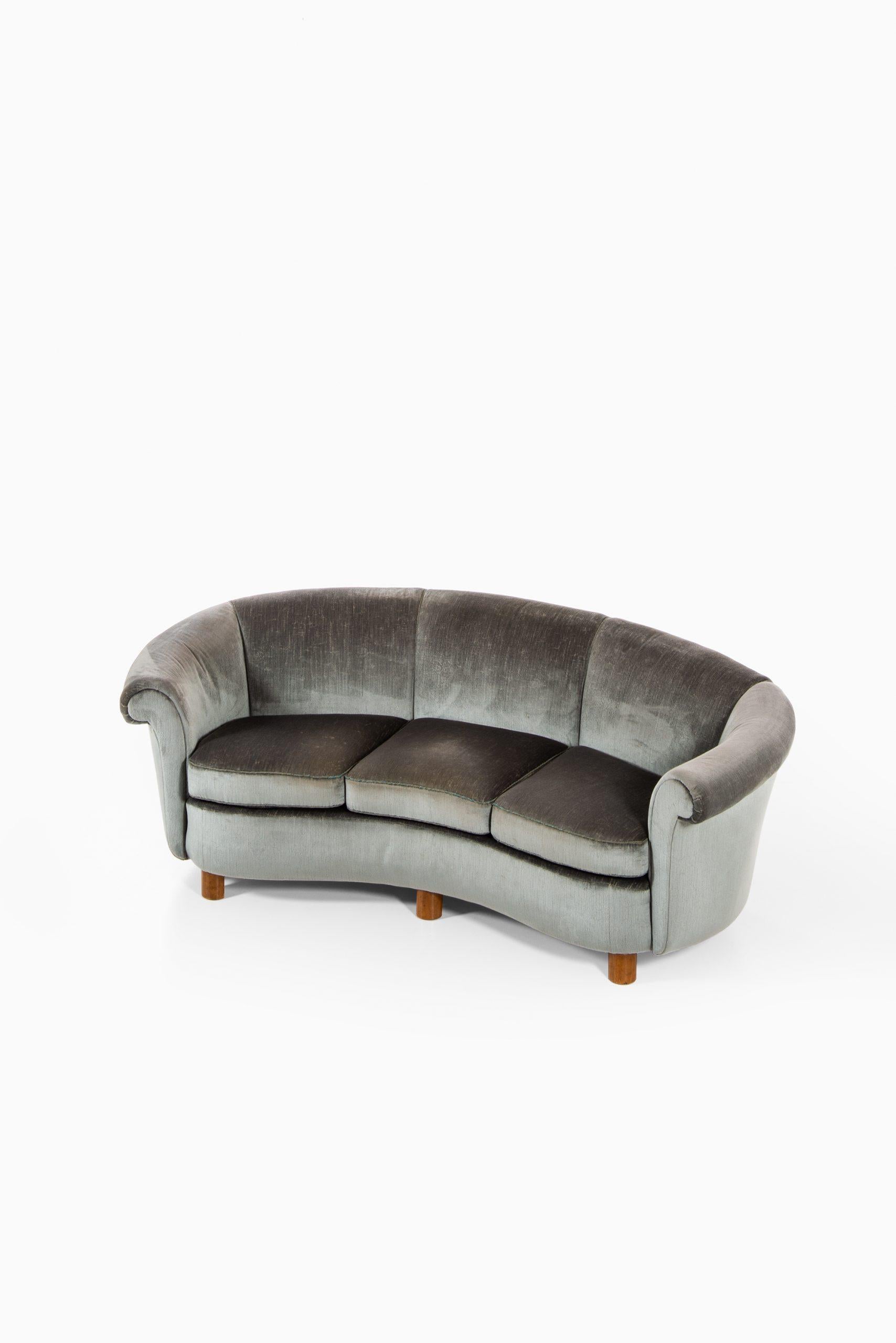 Very rare and big curved sofa attributed to Otto Schulz. Produced by Boet in Sweden.