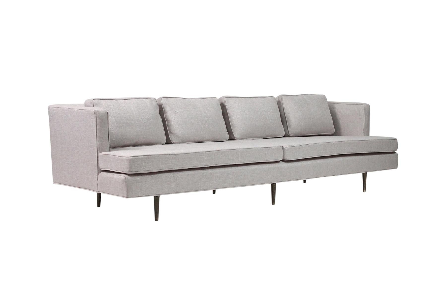 Sofa by Edward Wormley for Dunbar with brass legs. Model 4906
Sofa has been recently and expertly reupholstered.