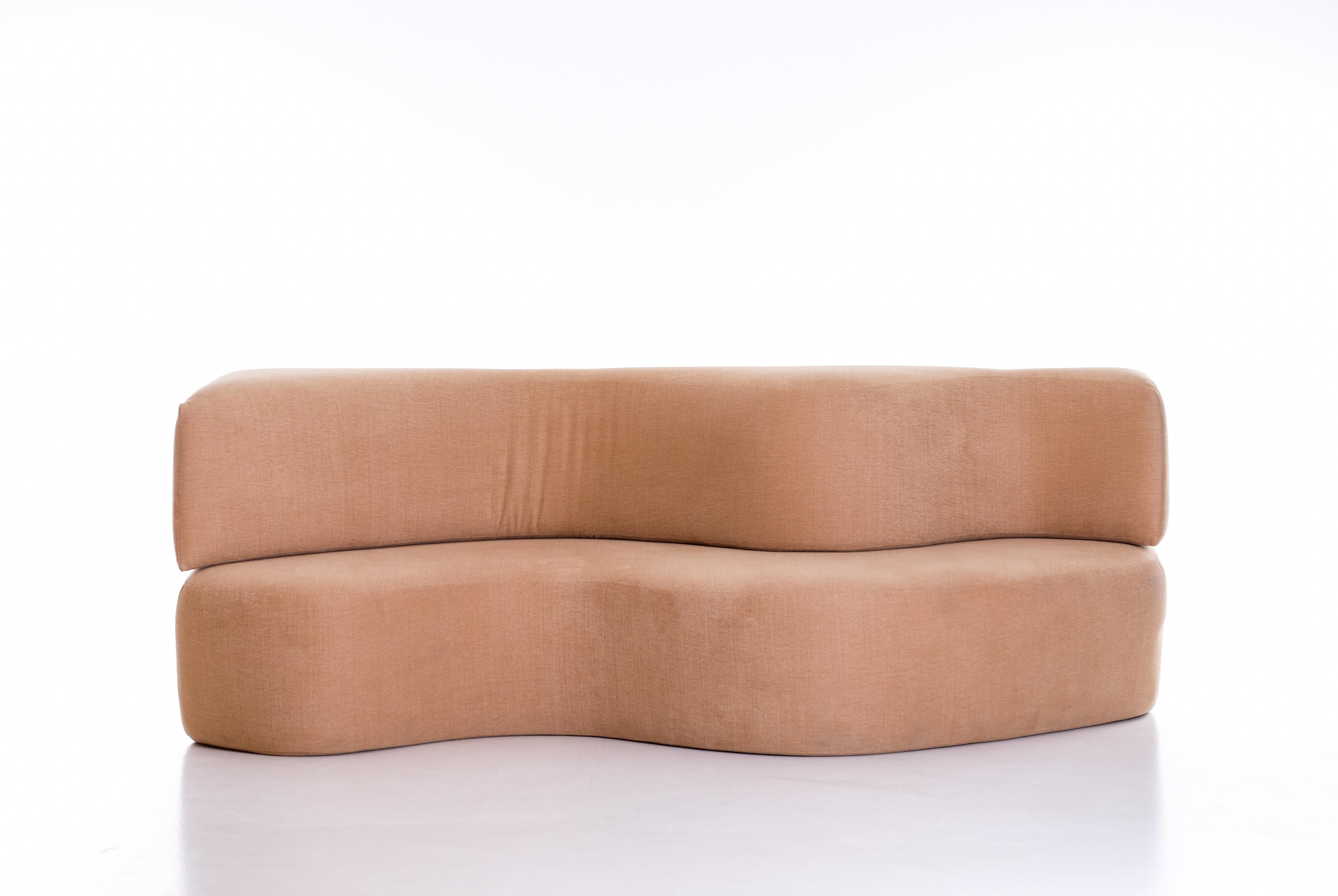 Originally designed in 1966 by the Florentine Radical group Archizoom, this was the first sofa without a conventional frame. It is composed of two waves made from a polyurethane block cut into two parts with an S-shaped incision, which can be
