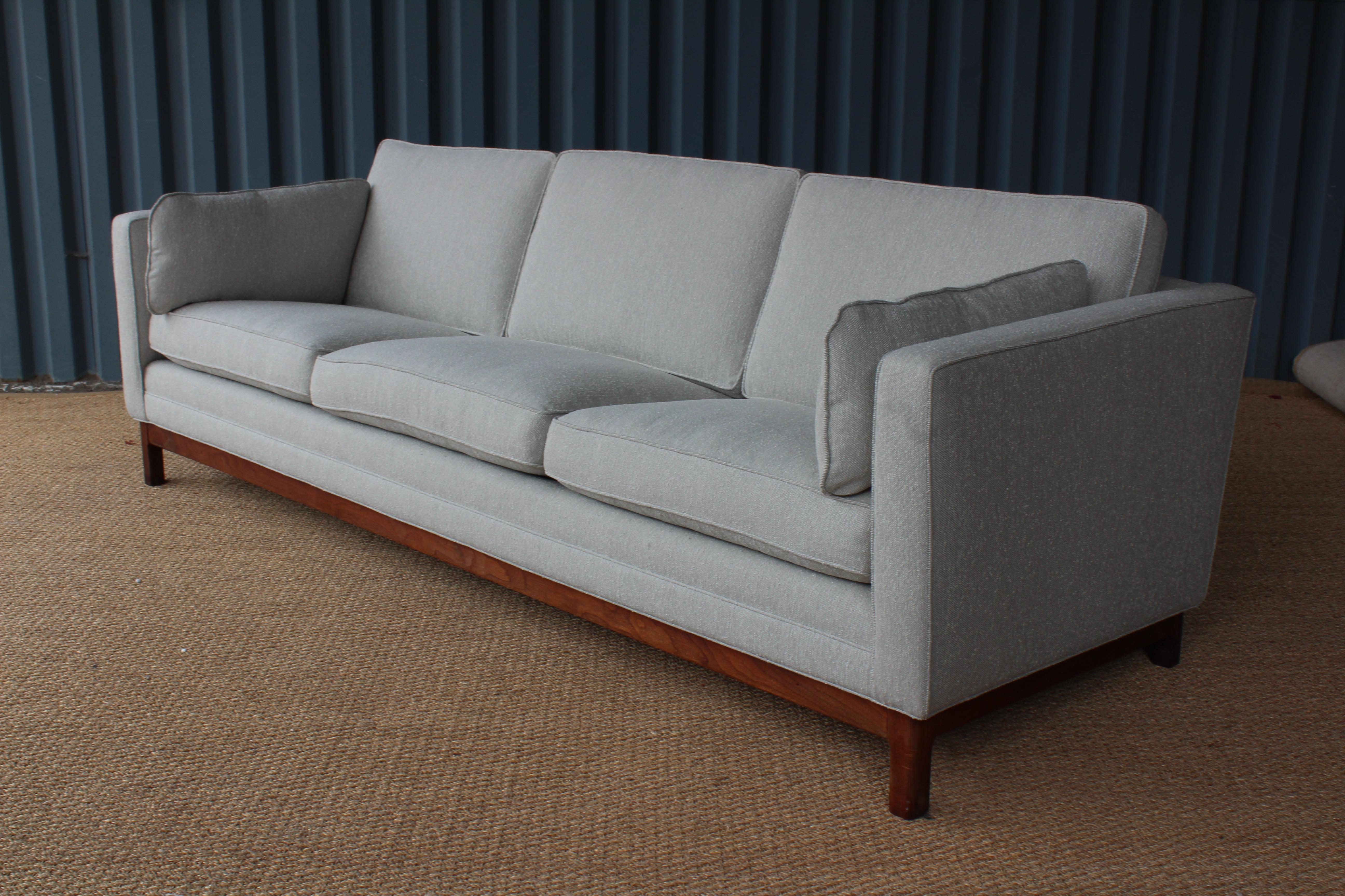 1950s sofa designed by Folke Ohlsson for DUX, Sweden, 1950s. New performance woven upholstery. Solid walnut base.