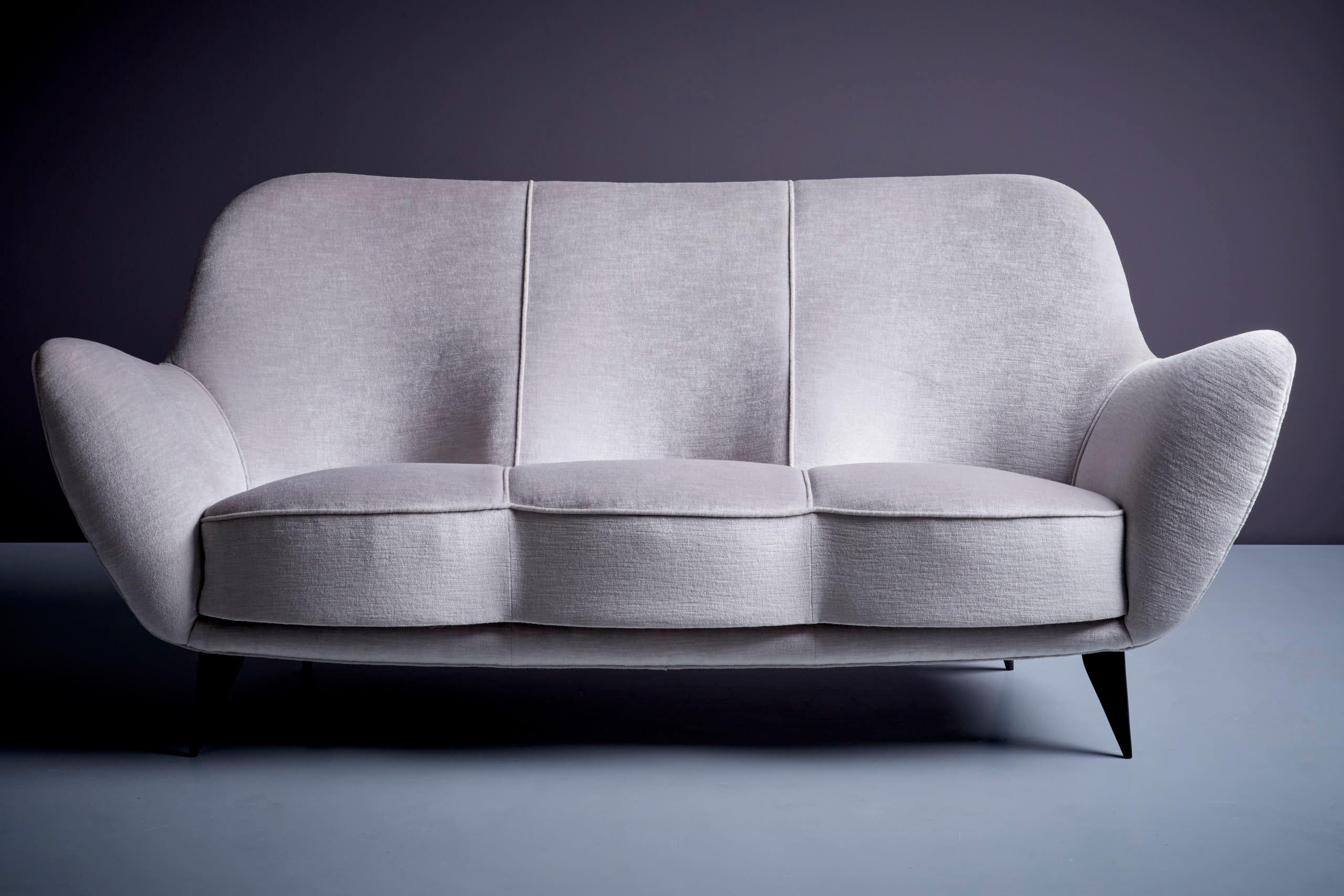 Newly upholstered 3-seater sofa by Guglielmo Veronesi for ISA Bergamo, 1950s. A matching pair of Lounge Chairs in the same fabric is listed, too.