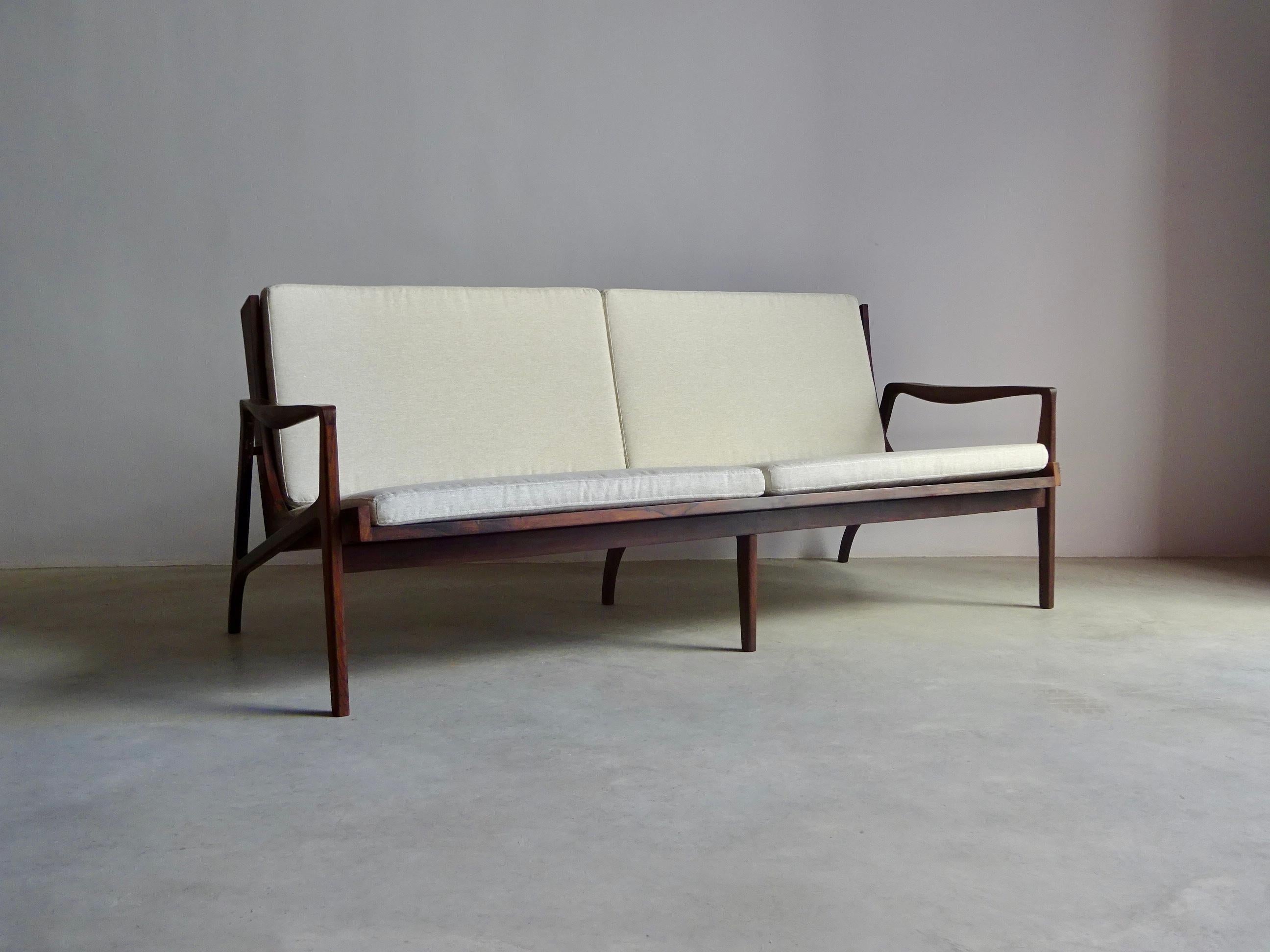 Sofa designed and produced by “Liceu de Artes e Ofícios” around 1960’s in Belo Horizonte, Brazil. Solid wood, brass details and new upholstery. Ready to use.